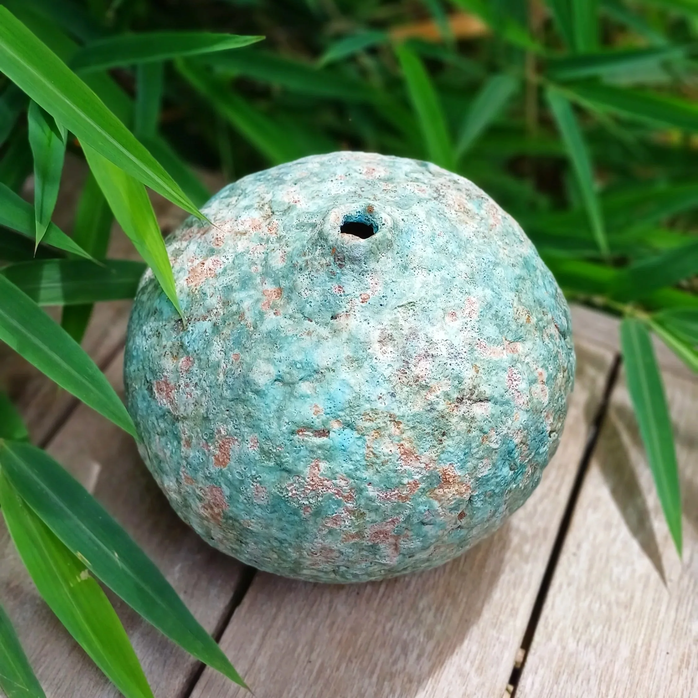 Pod with copper and bright green by Claire Lardner Burke