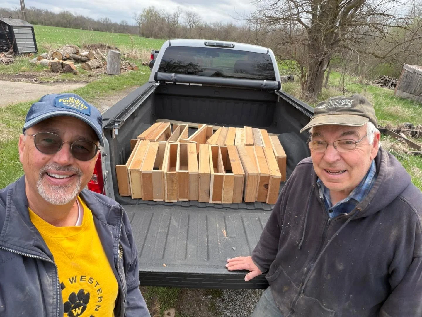 Thank you Dan and Jim for building wooden trays for us! They are crucial for our seedling production. First we use our soil blocker tool, then we place the blocks on wooden trays, next we seed them, and finally we set them under the grow lights to ge