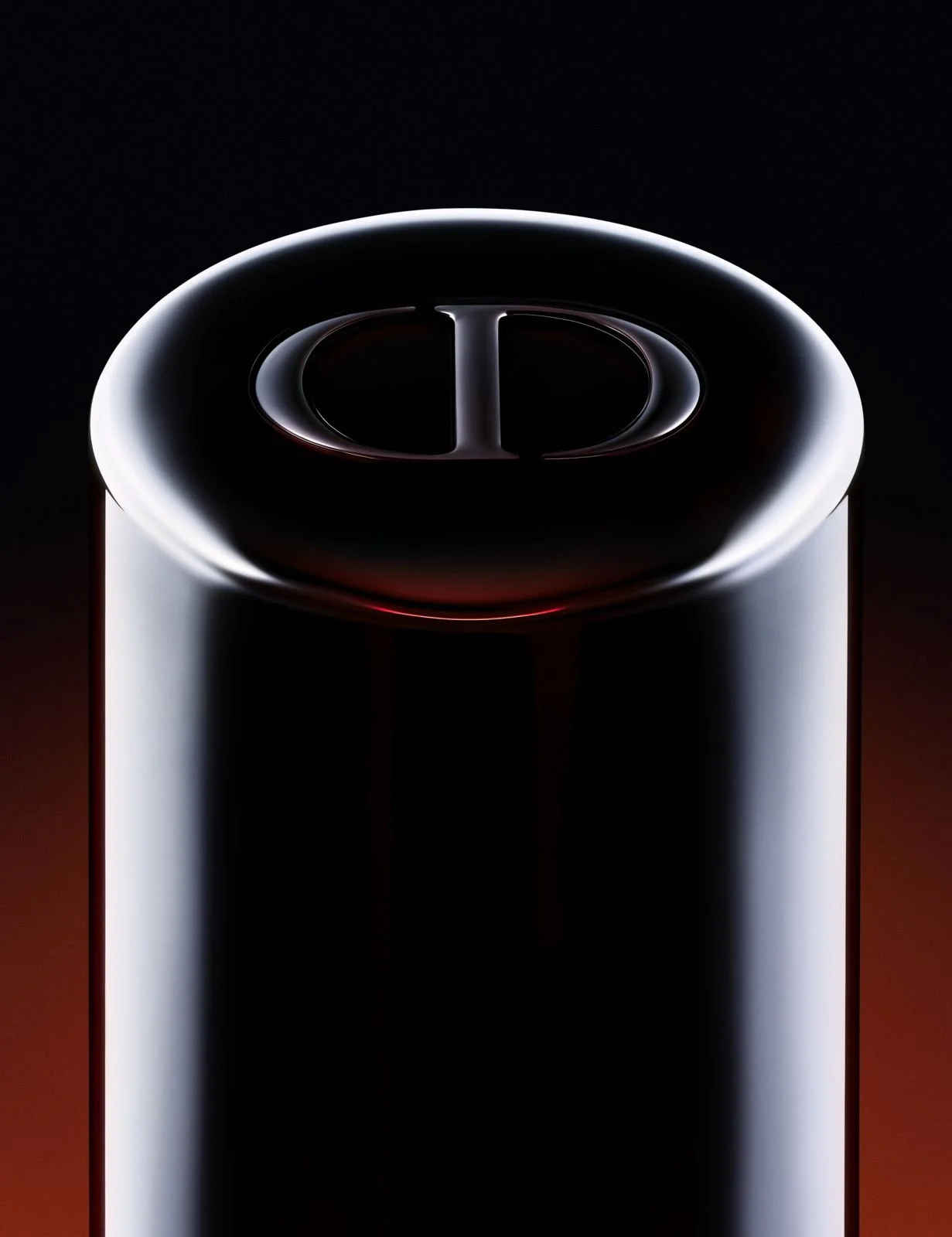 Close-up of a black soda can with a glossy finish and a smooth top, featuring a pull-tab opening.