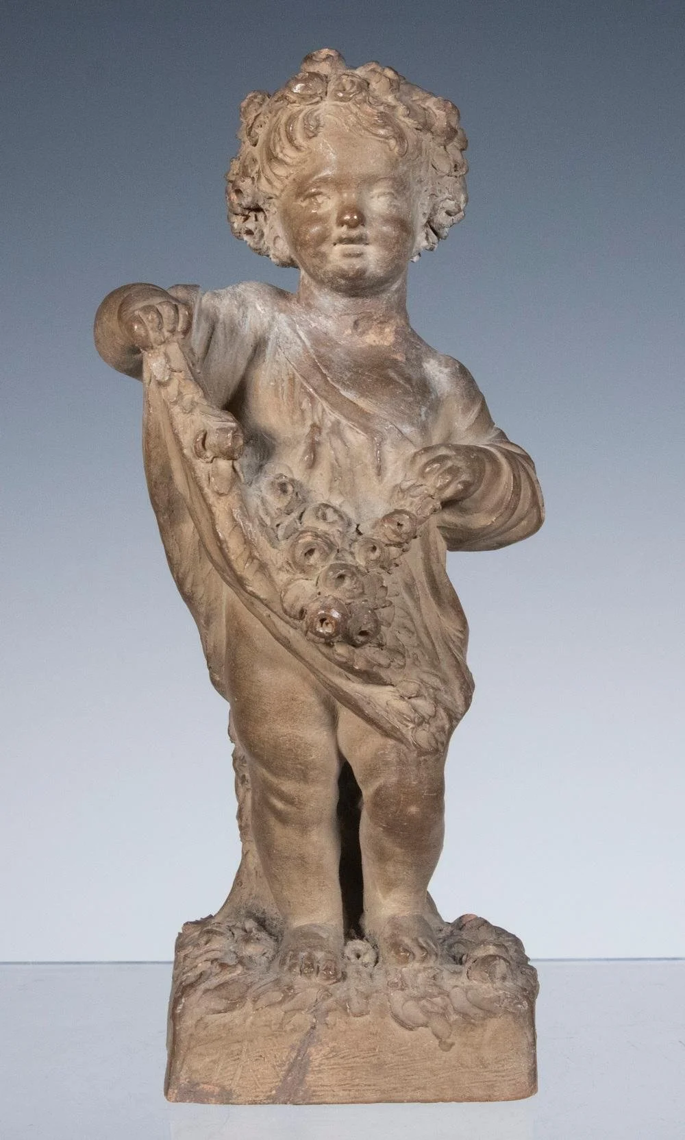 Terracotta Figure of Child with Flowers