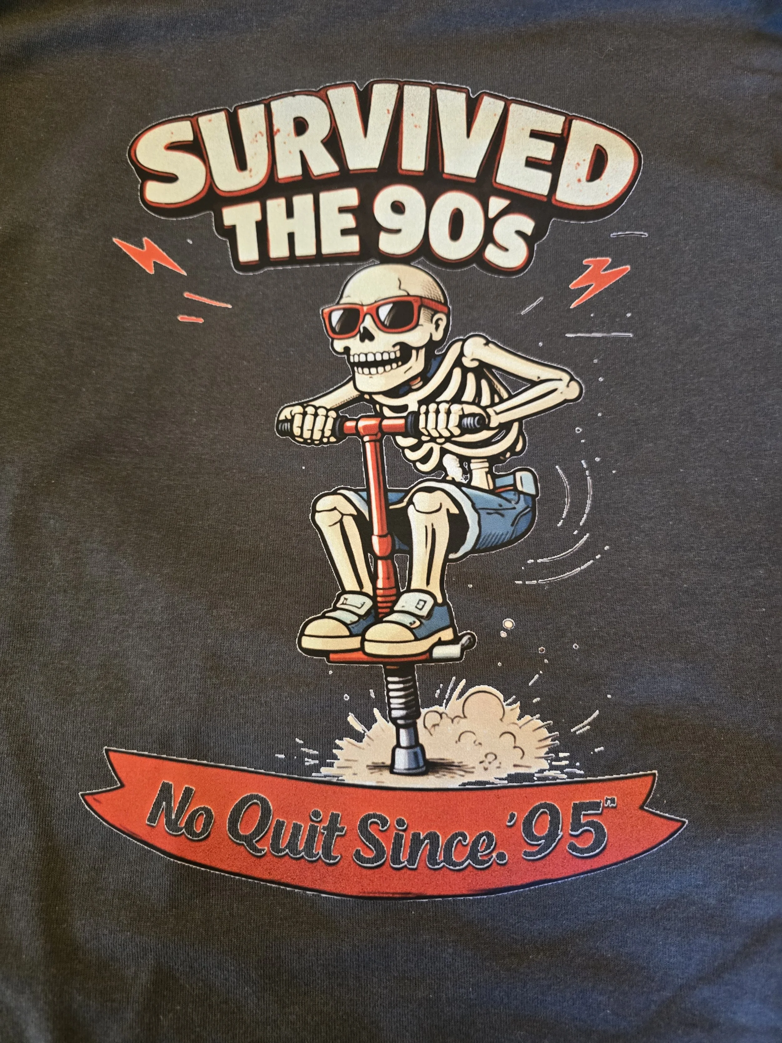 Rasied by the 90s Pogo on dark gray.jpg