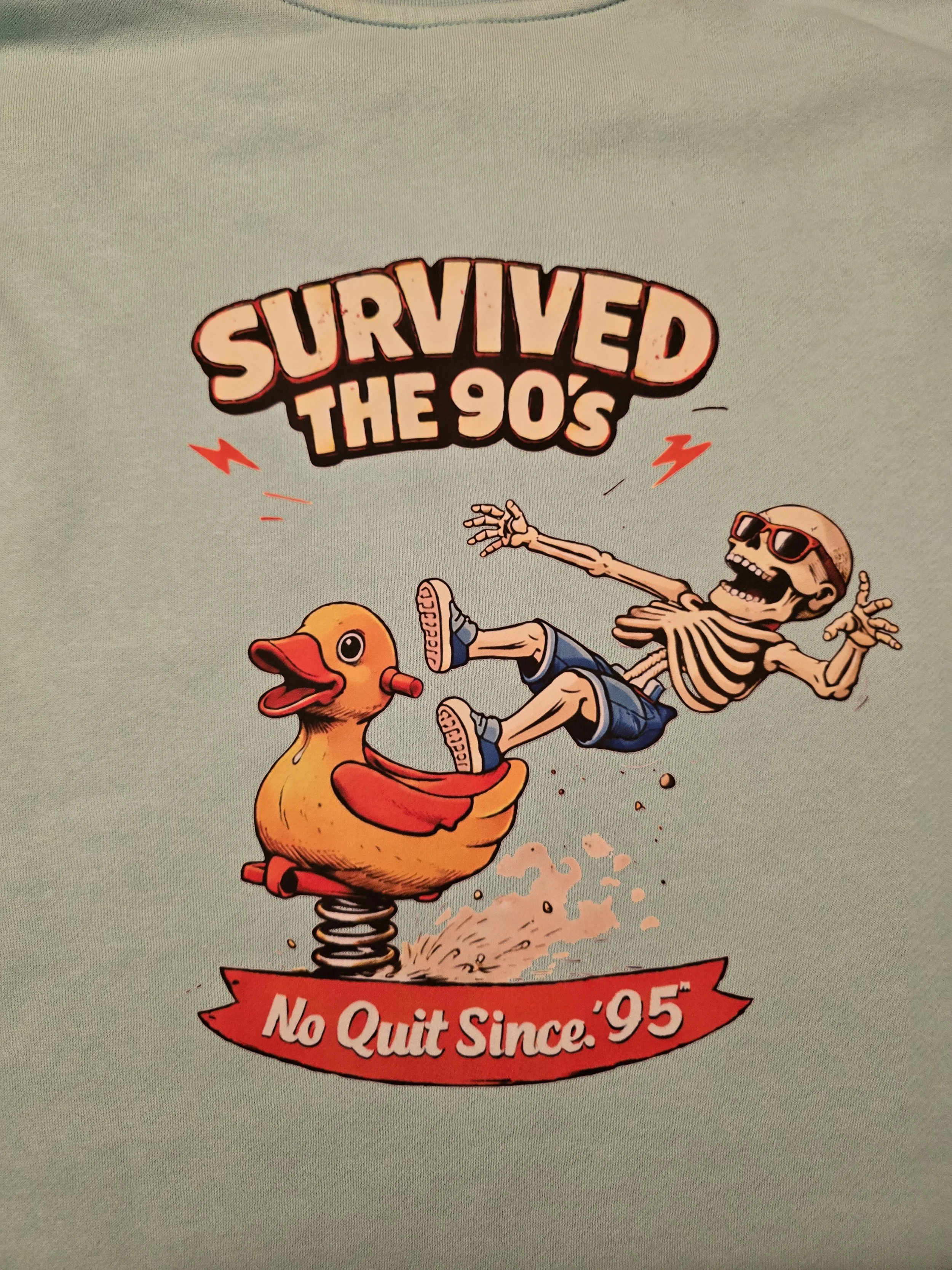 Rasied by the 90s Pogo on Play Ground Slinky on light Blue.jpg