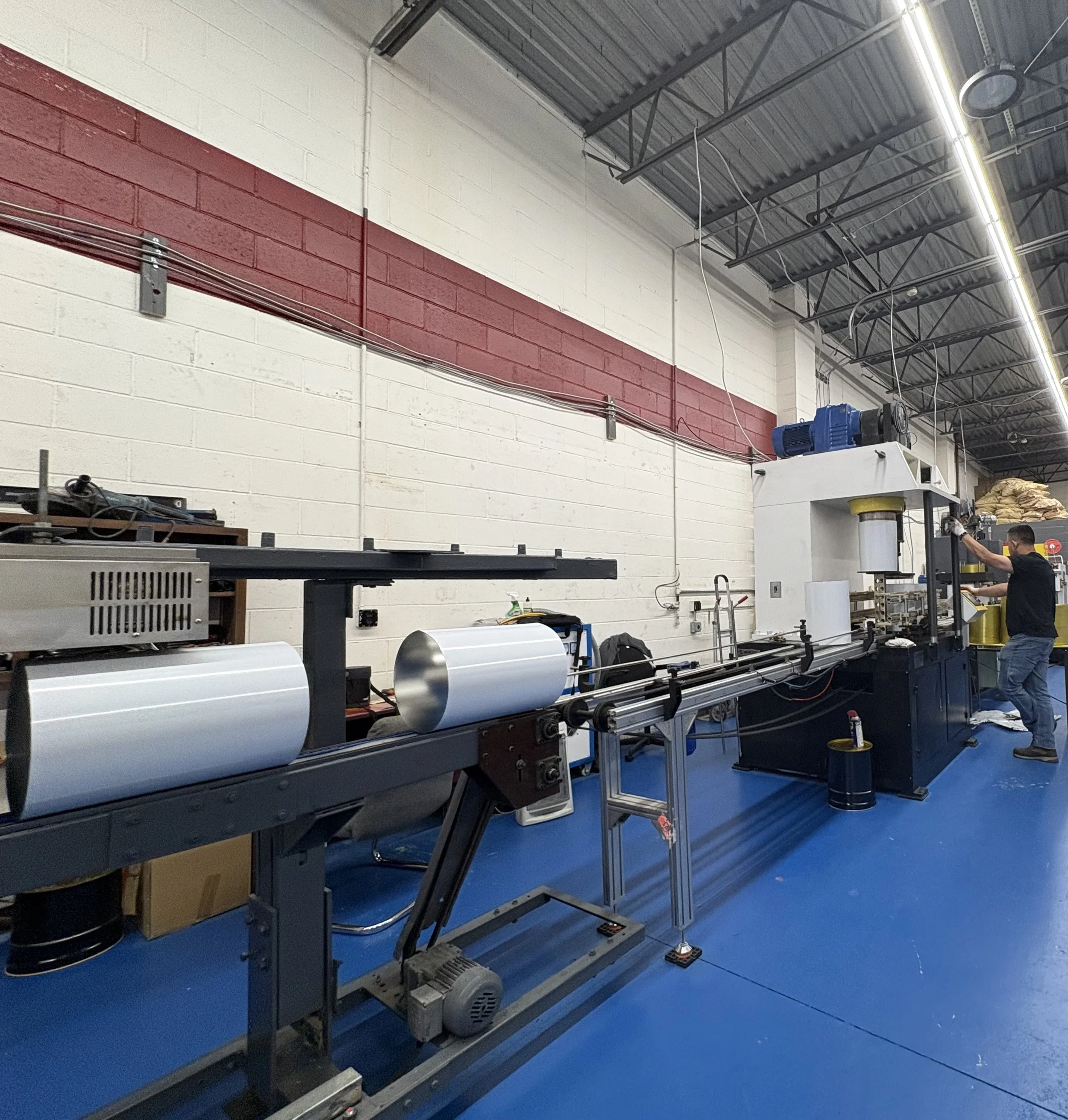 assembly line in Long Island, New York producing pails for the tri state area including New Jersey