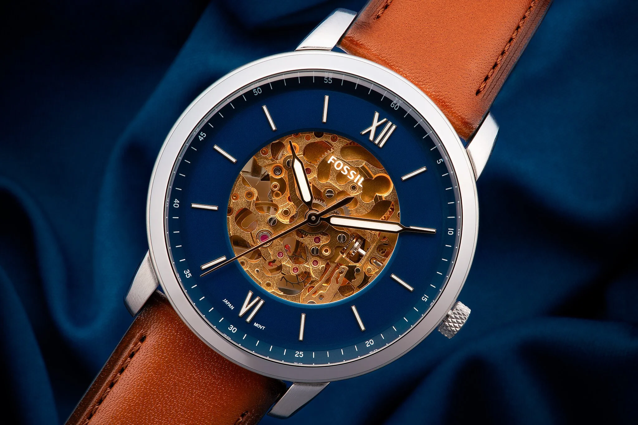 Skeleton Fossil Watch on Blue Fabric