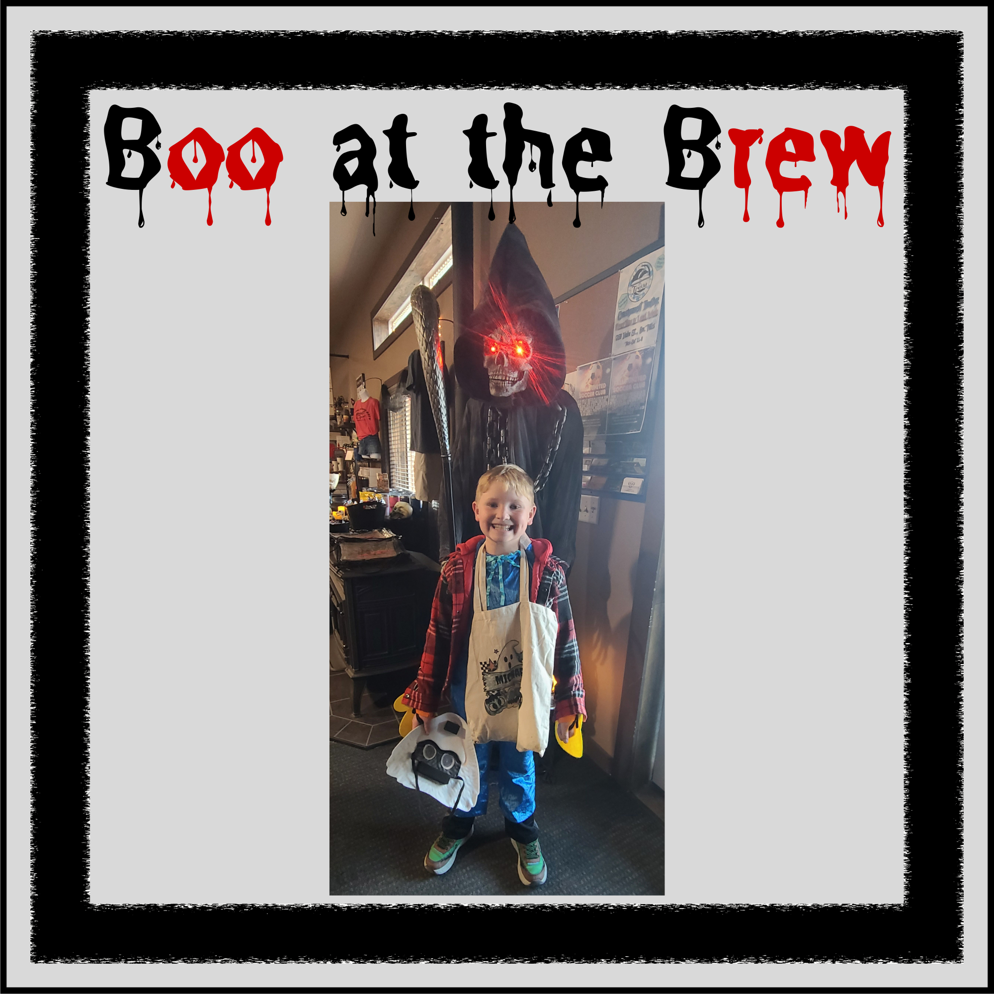 Elliot standing in front of a Halloween Grim Reaper display at Morning Wood Brew during the Boo at the Brew event