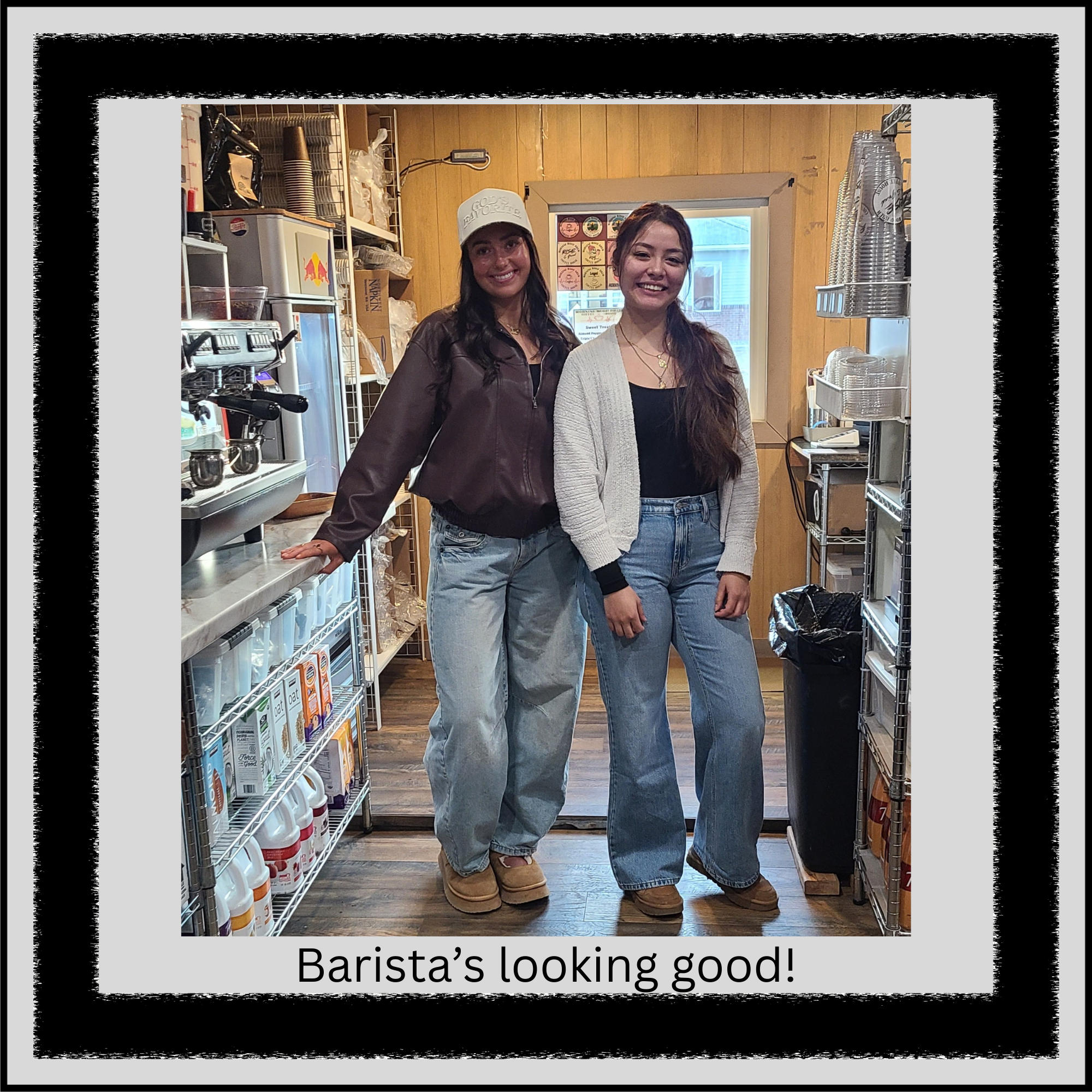 Two baristas preparing espresso drinks at the espresso machine inside Morning Wood Brew