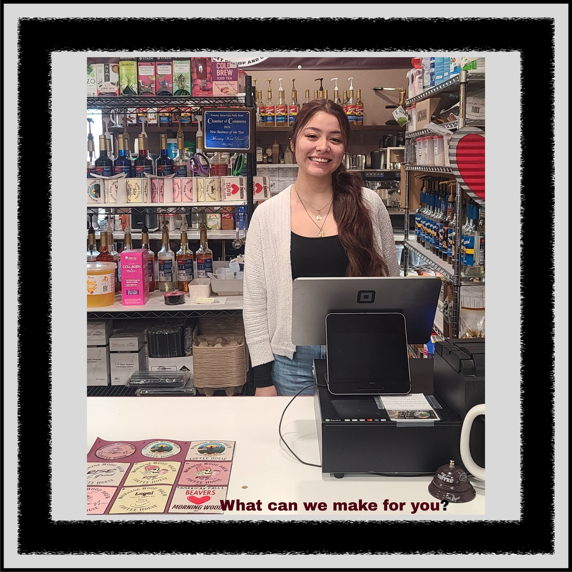 Gali working at the register inside Morning Wood Brew coffee house