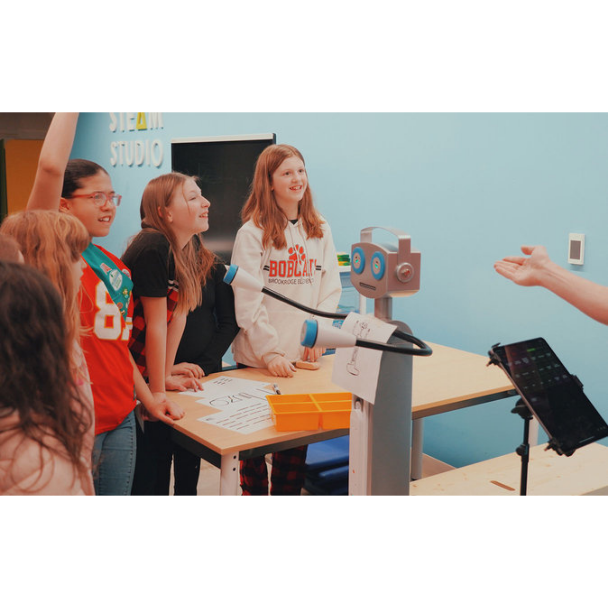 JuiceBot with students.png