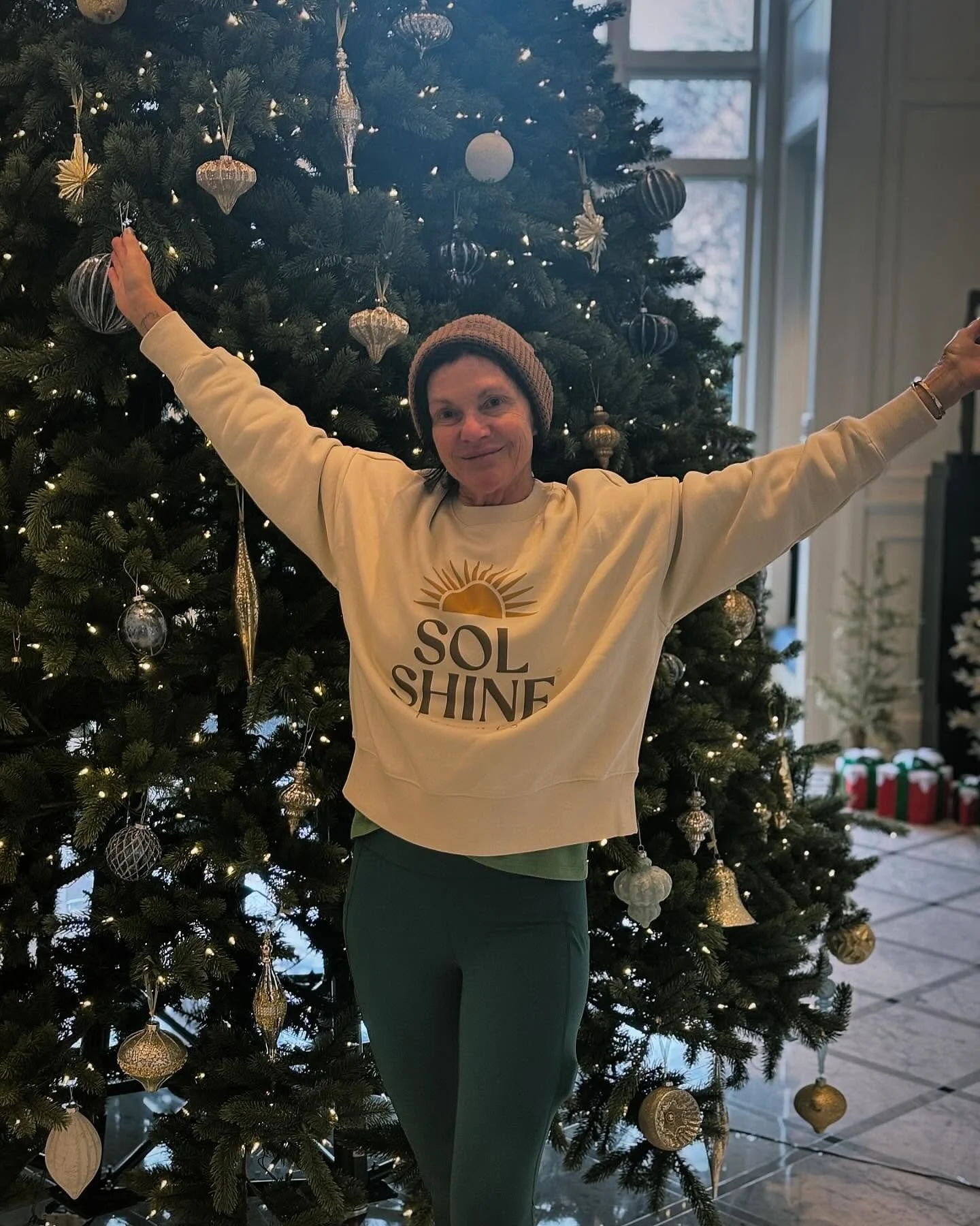 Happy Cindy wearing our Sol Shine sweatshirt ☀️🎄🔔🎁☀️