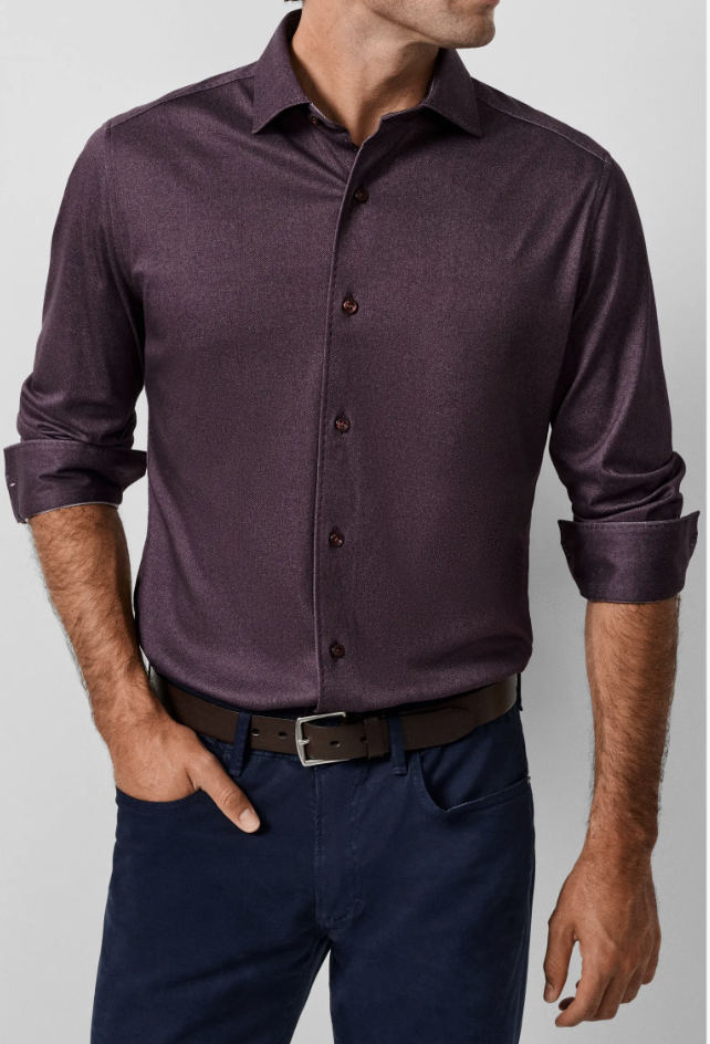 Man wearing the David Donahue Solid Texture Knit Sport Shirt in plum with the sleeves rolled.