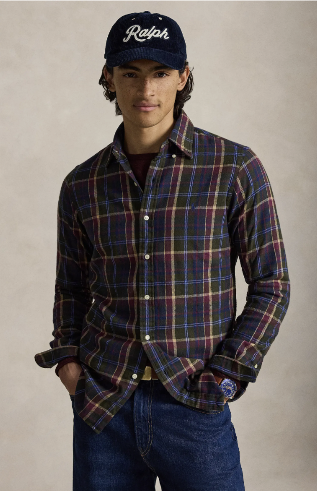 Man wearing the Polo Ralph Lauren Plaid Brushed Cotton Flannel Shirt in navy, burgundy and green plaid with a navy Ralph cap.