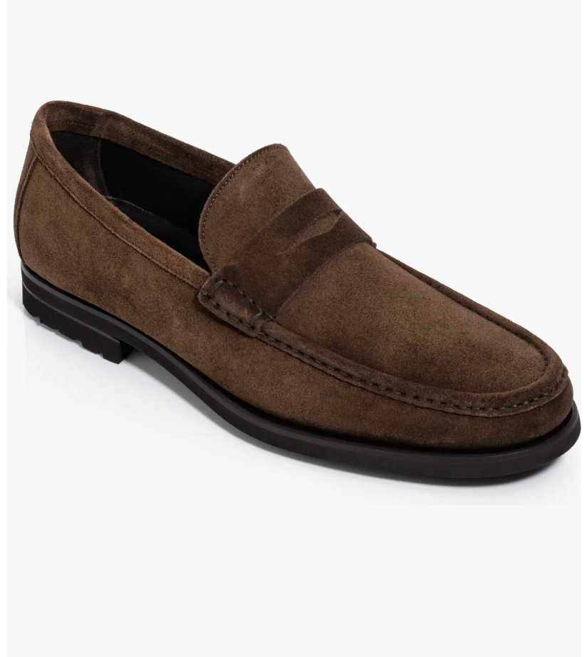 A dark brown suede To Boot New York Belfast penny loafer with a chunky black lugged rubber sole.