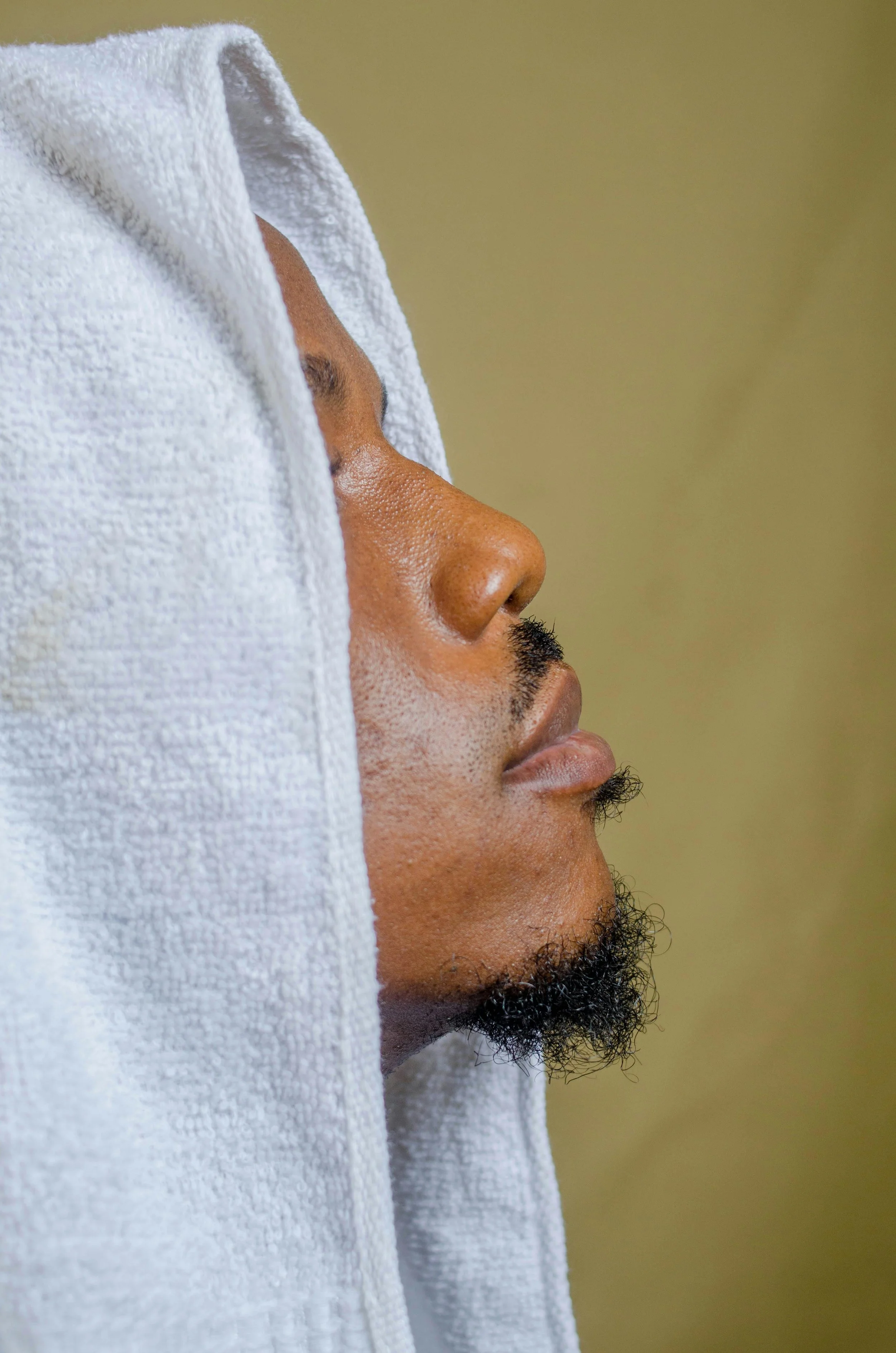 Professional beard grooming results featuring a clean trim and shaped facial hair for men's style guide.