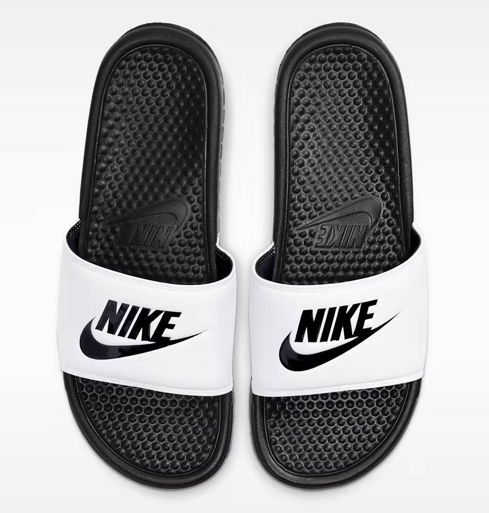 A pair of Light Gray Hari Mari Dunes waterproof flip flops for men, featuring memory foam toe posts and specialized siped outsoles for boat-safe grip.