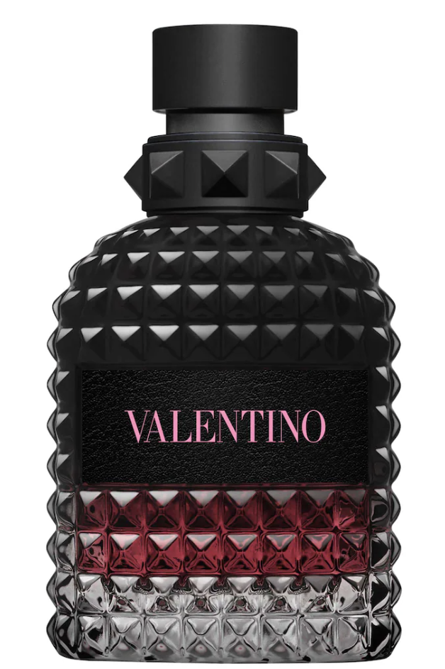 Black and deep red studded glass bottle of Valentino Uomo Born In Roma Intense with pink logo lettering.