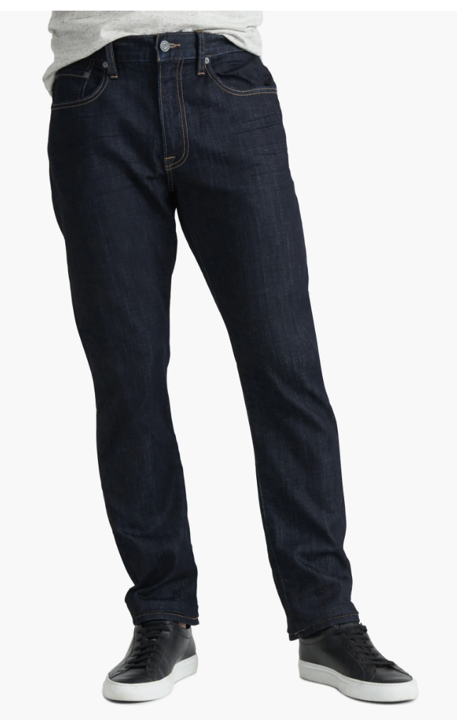 Lucky Brand 410 Athletic Slim Fit jeans in a dark indigo wash, featuring CoolMax moisture-wicking technology for men with muscular thighs.