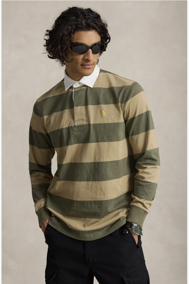 Man wearing the Polo Ralph Lauren Rustic Rugby Shirt with olive and tan stripes and a white collar.