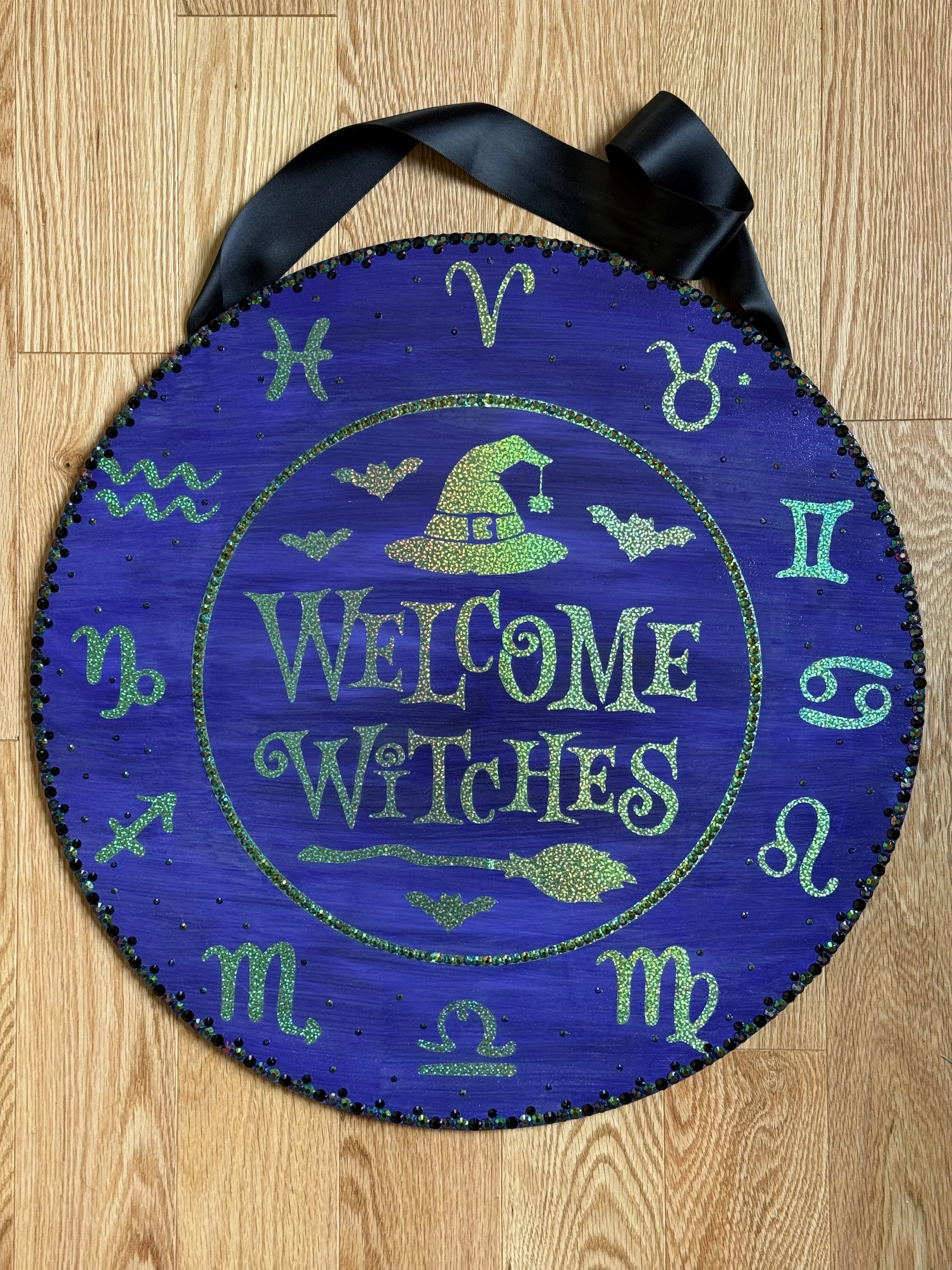 "Welcome Witches"  Front door hanging sign. Featuring iridescent zodiac symbols and embellished with rhinestones. 