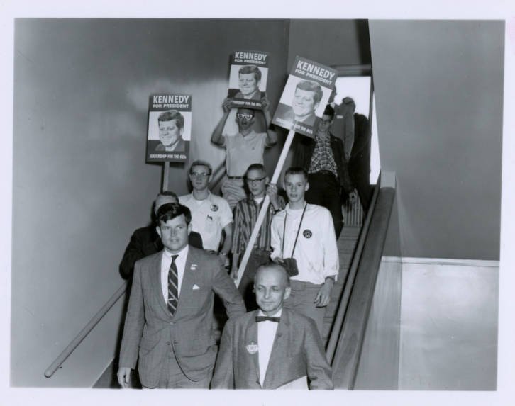 Rob Castleberry and Bob Klavano (both on the upper stairs) help escort Ted Kennedy in his visit to Pullman in 1960 during his campaign appearance for JFK