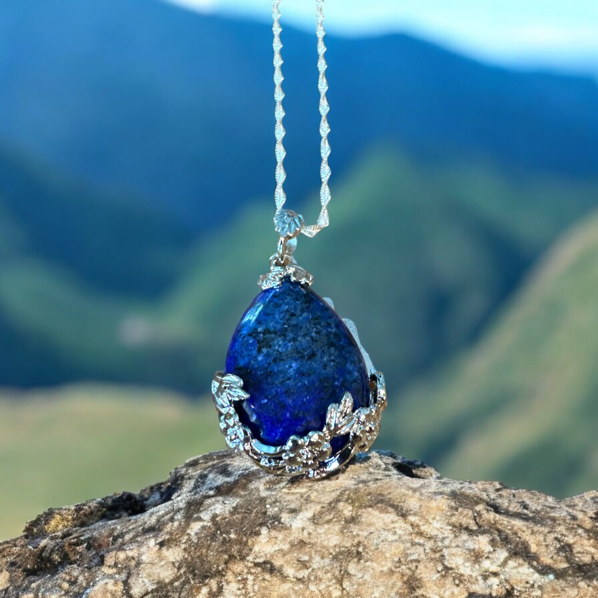 Item 671. Blue Stone in a flower setting
