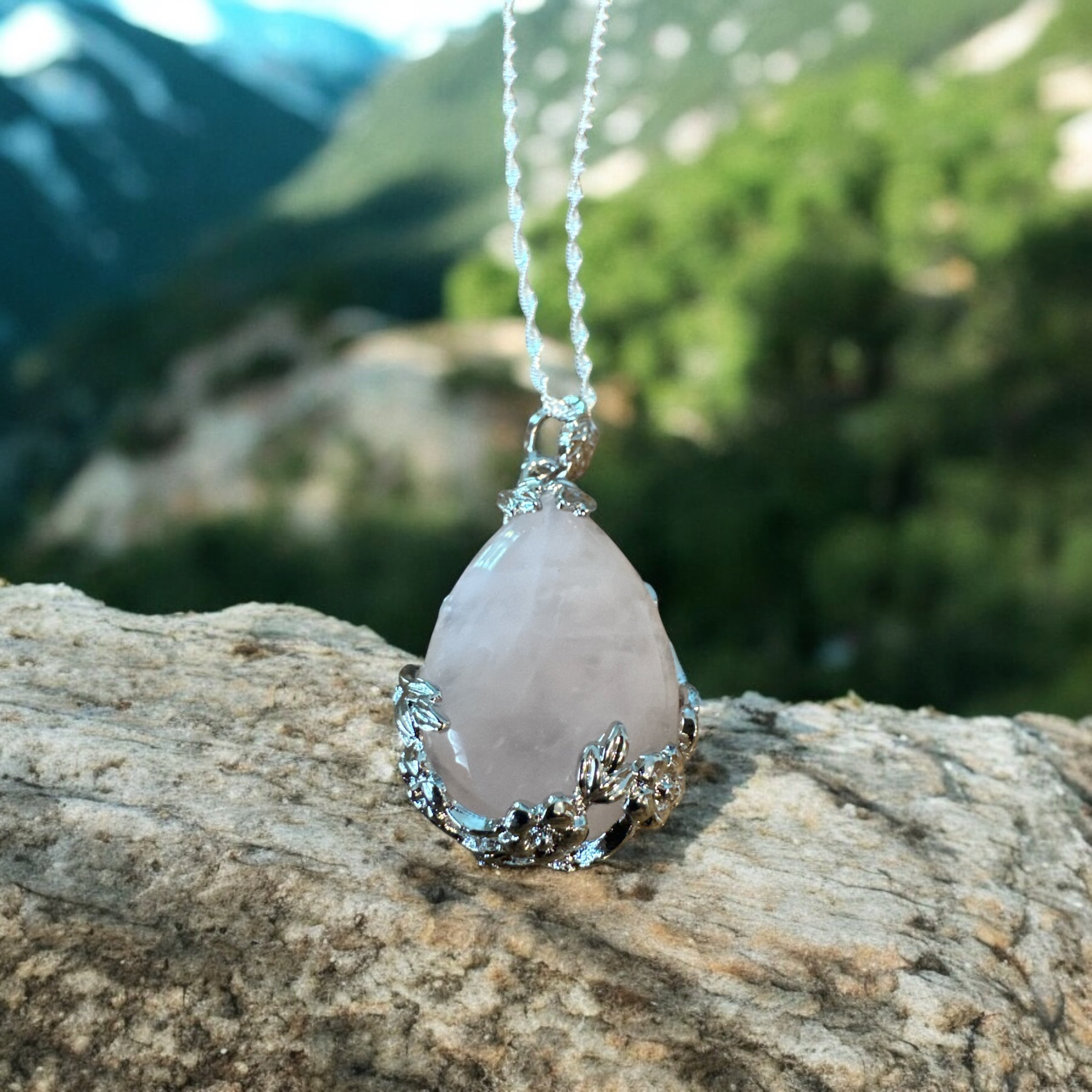 Item 672. Pink stone in a flower setting