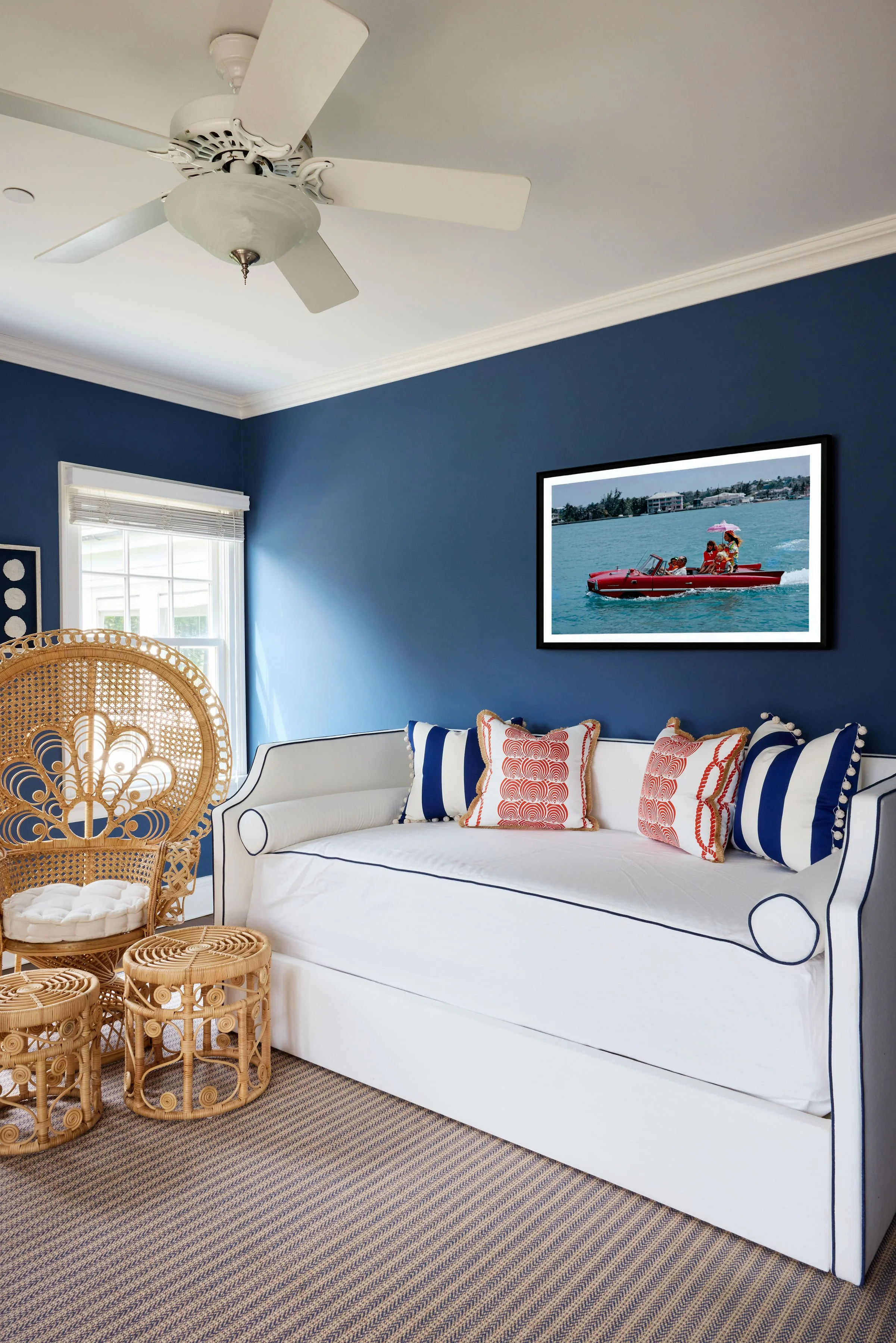 A ceiling fan in a Southampton, NY summer home with broad, gently curved blades | Style and Space Interior Design, NY