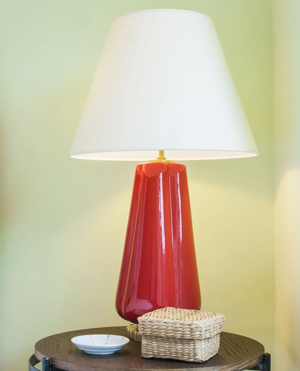 I love when a home tells its story in the details. In this Seattle home guestroom, a sculptural ceramic lamp brings warmth and a soft pool of light&mdash;perfect for evening reading. ⁠
⁠
I aim for one ambient source and one task source in every guest