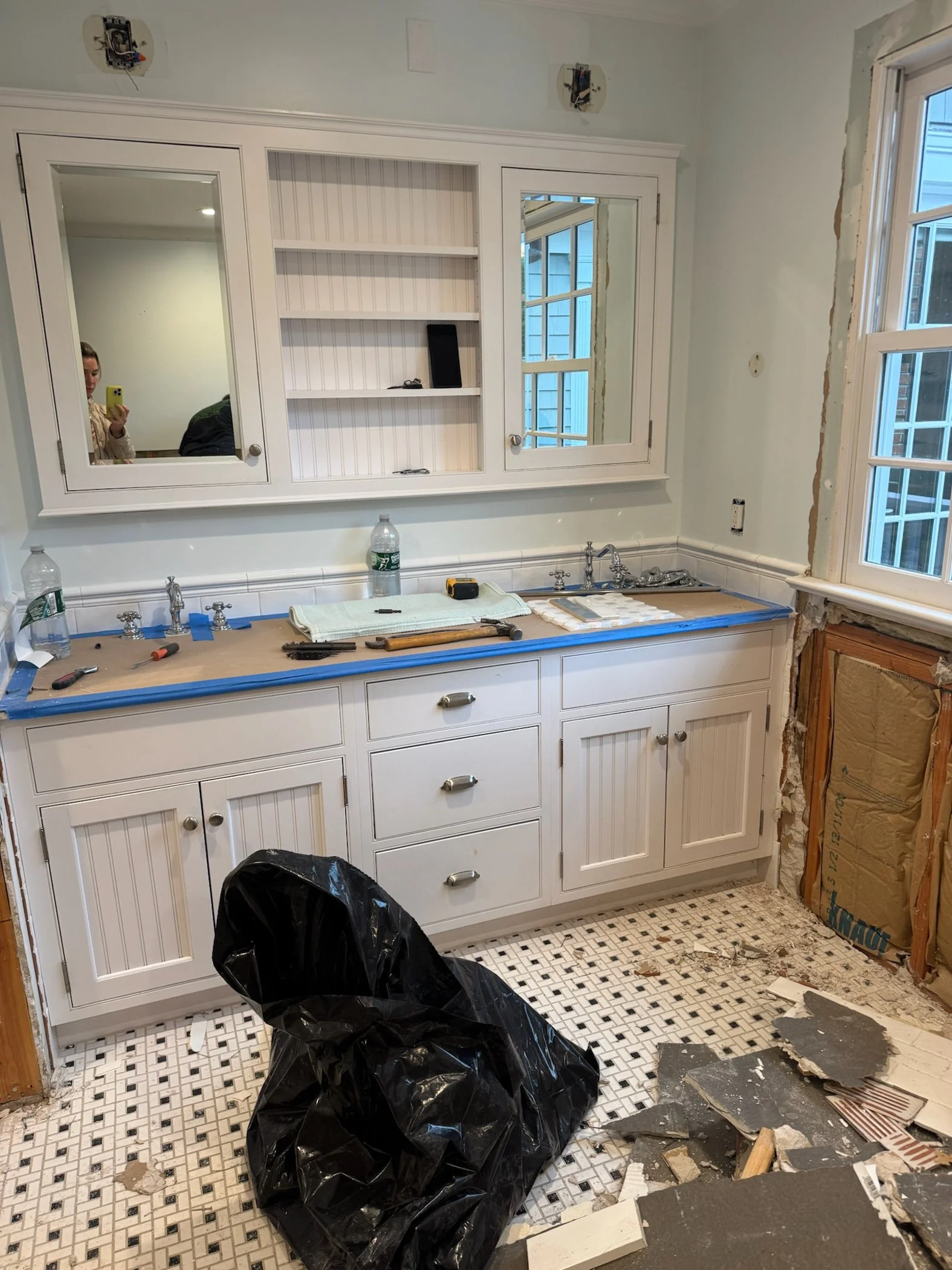 Kelsey Peterson of Style and Space Interiors on a site visit during an interior design renovation in New York