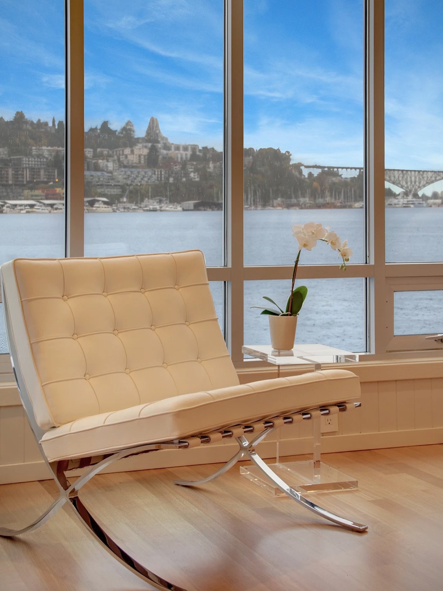 A quiet moment, right on the water 🤍
 
In this floating home outside Seattle, we chose this Barcelona Chair from @designwithinreach as the perfect piece to take in the view. It&rsquo;s an easy spot for morning coffee, a good book, and watching the l