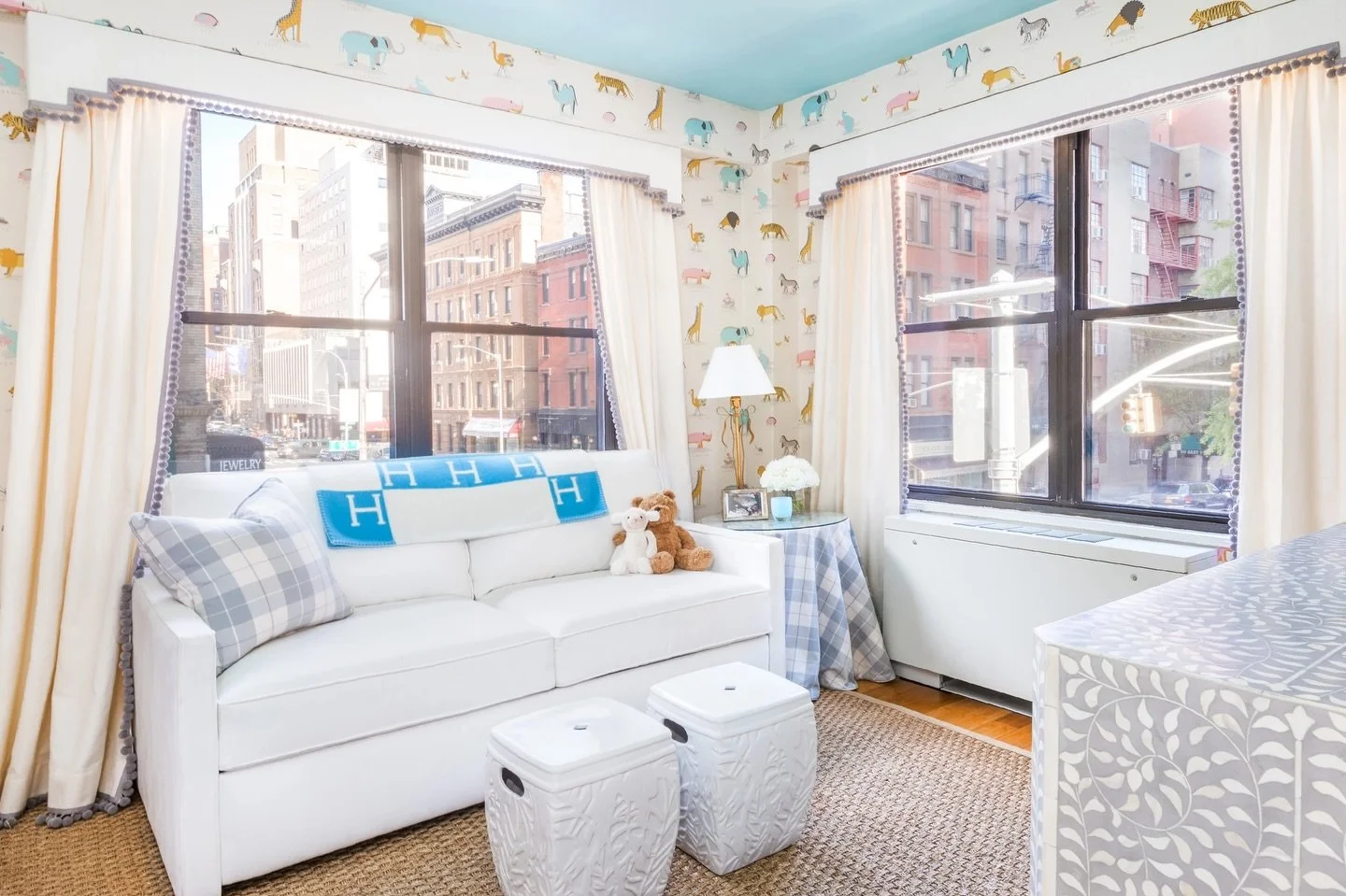 A kids&rsquo; room filled with style and joy!

In this Carnegie Hill family condo, playful details lead the way, from the animal print wallpaper by @sanderson1860 to the patterned dresser by @madegoods and a @serenaandlily mirror with extra texture ?