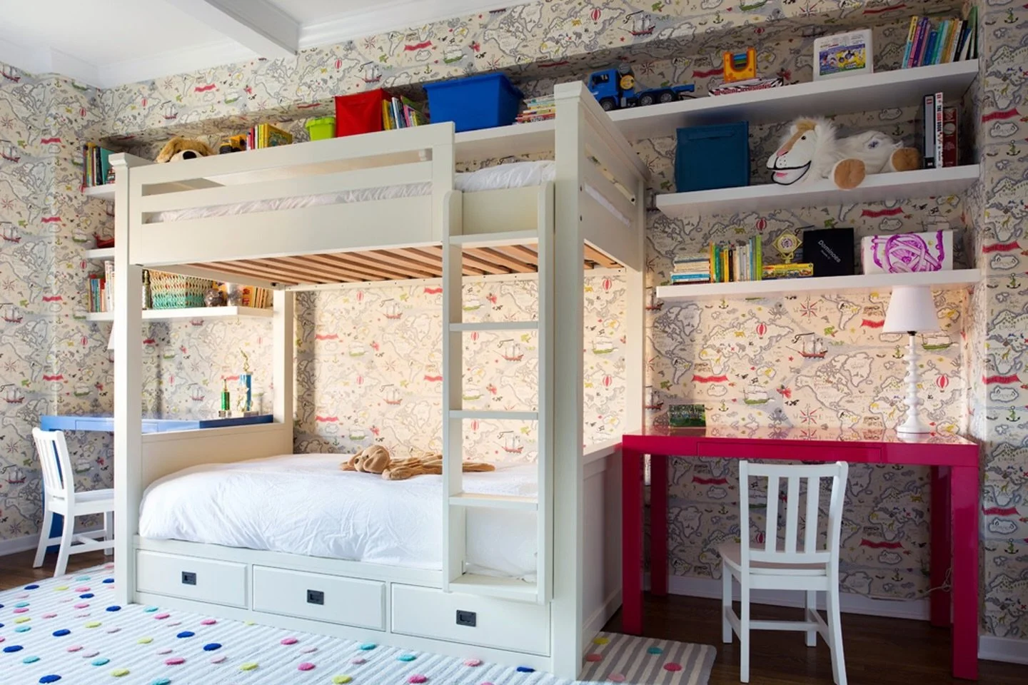 A kids&rsquo; room designed to flex with real life:
 
In this NYC family apartment, this kids&rsquo; room needed to feel shared and neutral but still personal. I custom-designed the desks and shelves to corral books, toys, and homework, with enough f