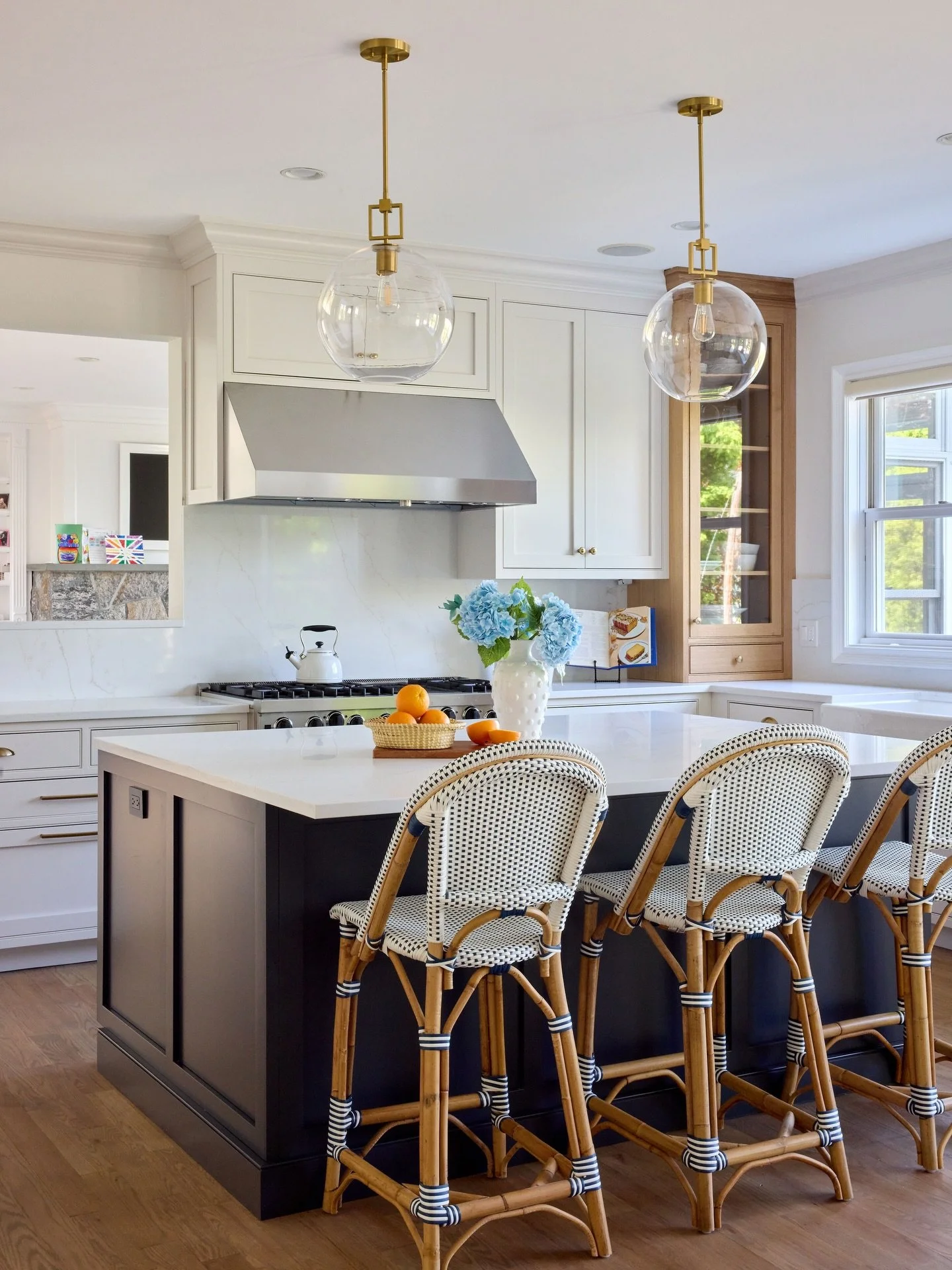 A Briarcliff Manor kitchen renovation transformation:
 
What was once a darker, more dated space is now light, bright, and designed for the way this family lives today. Thoughtful updates to the cabinetry, island, storage, and overall flow completely