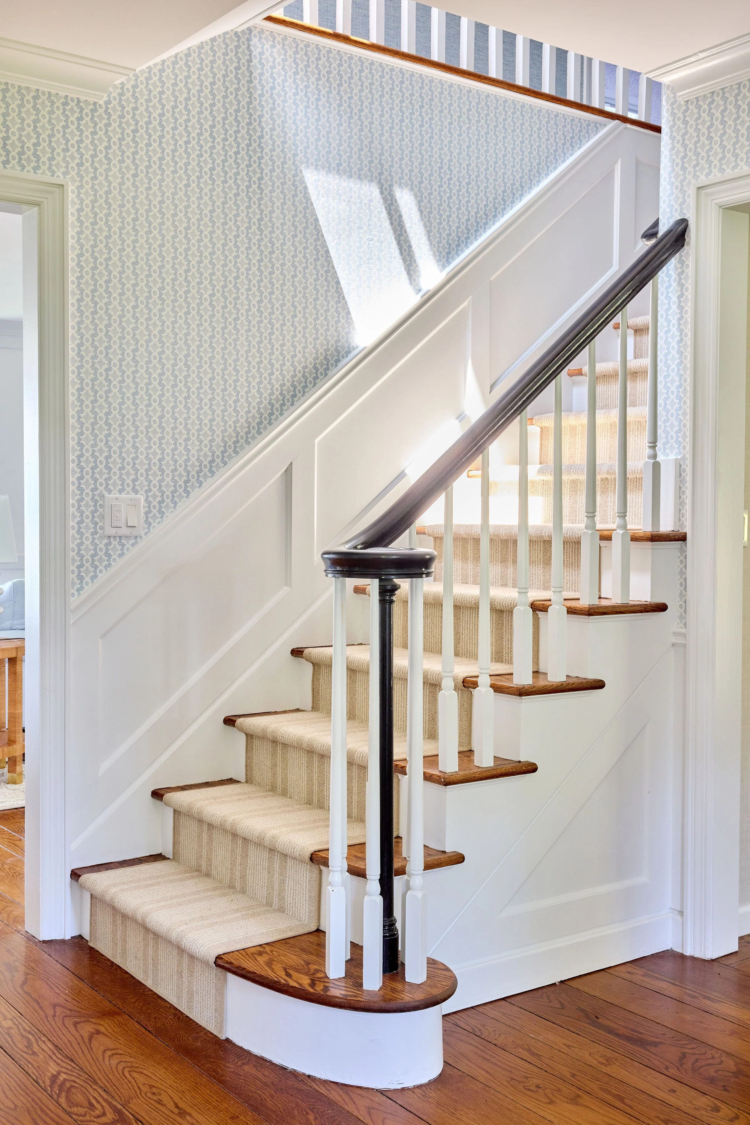 Sister Parish wallpaper and Wainscoting as Architecture in an entry foyer in New York | Style and Space Interiors