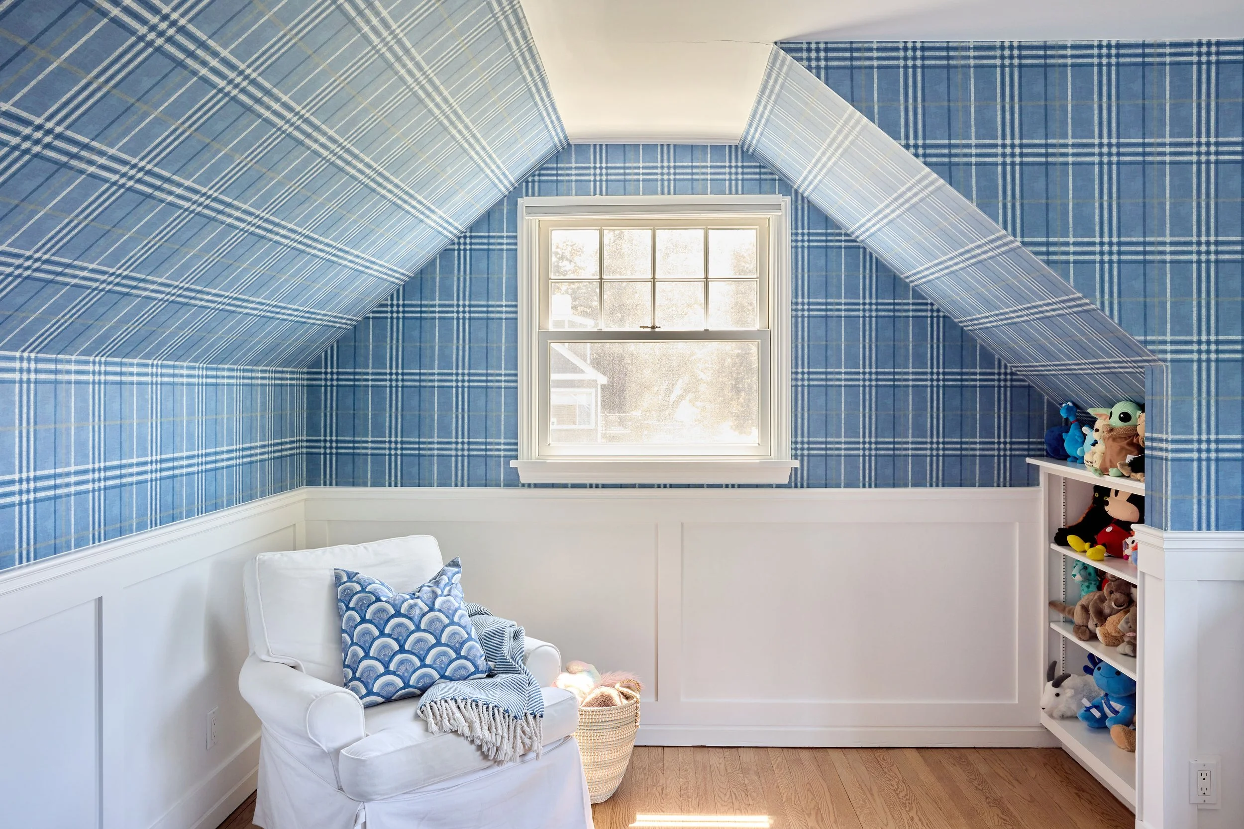 Blue plaid playroom with an angled ceiling | NY interior design | Style and Space Interiors