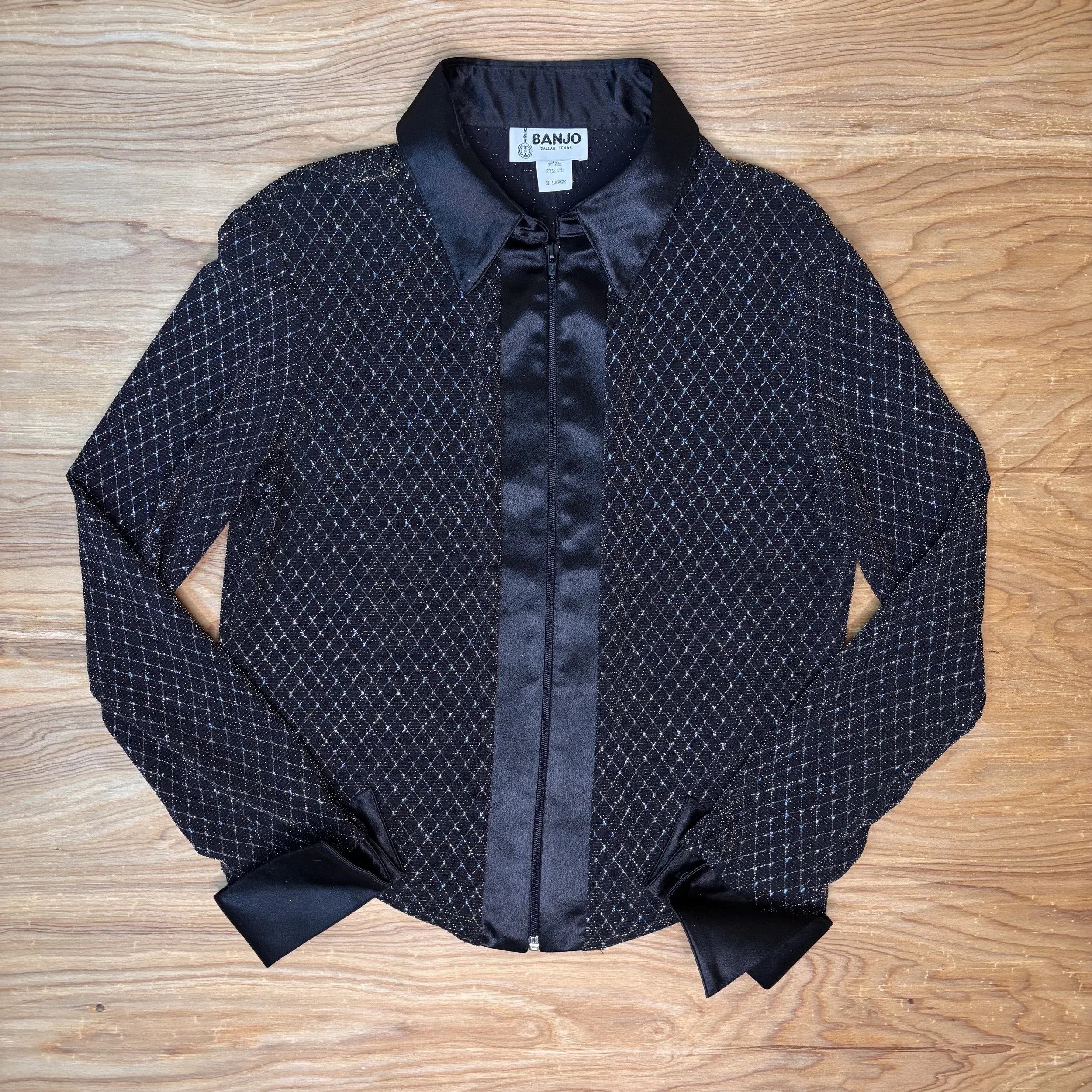 Front view of Banjo of Dallas black satin zip-front shirt with sparkle accents.