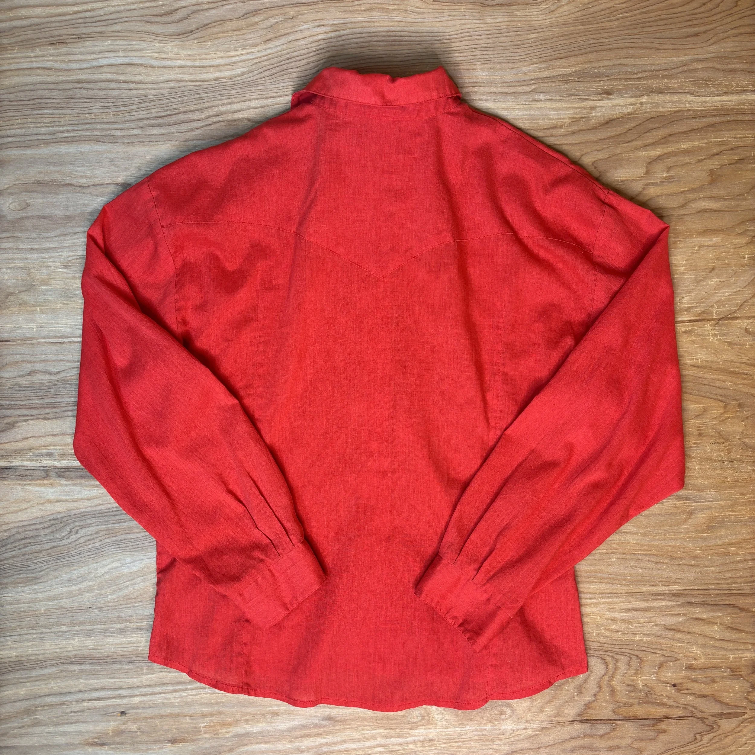 Back view of vintage Circle T red western shirt with subtle yoke seam detail