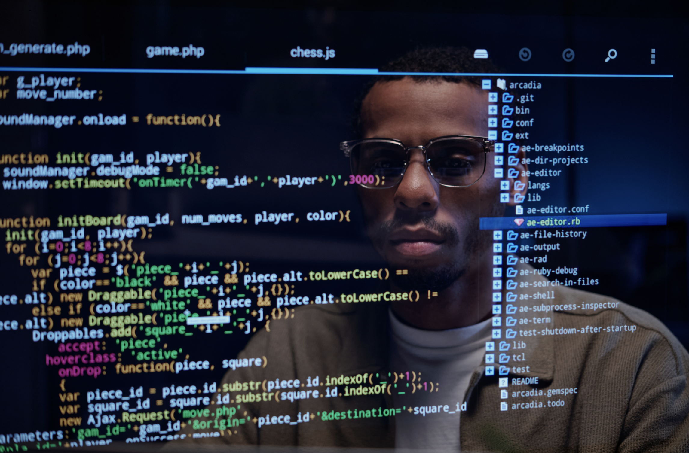 Double exposure of a man wearing glasses overlaid with lines of code and a file directory tree from a code editor