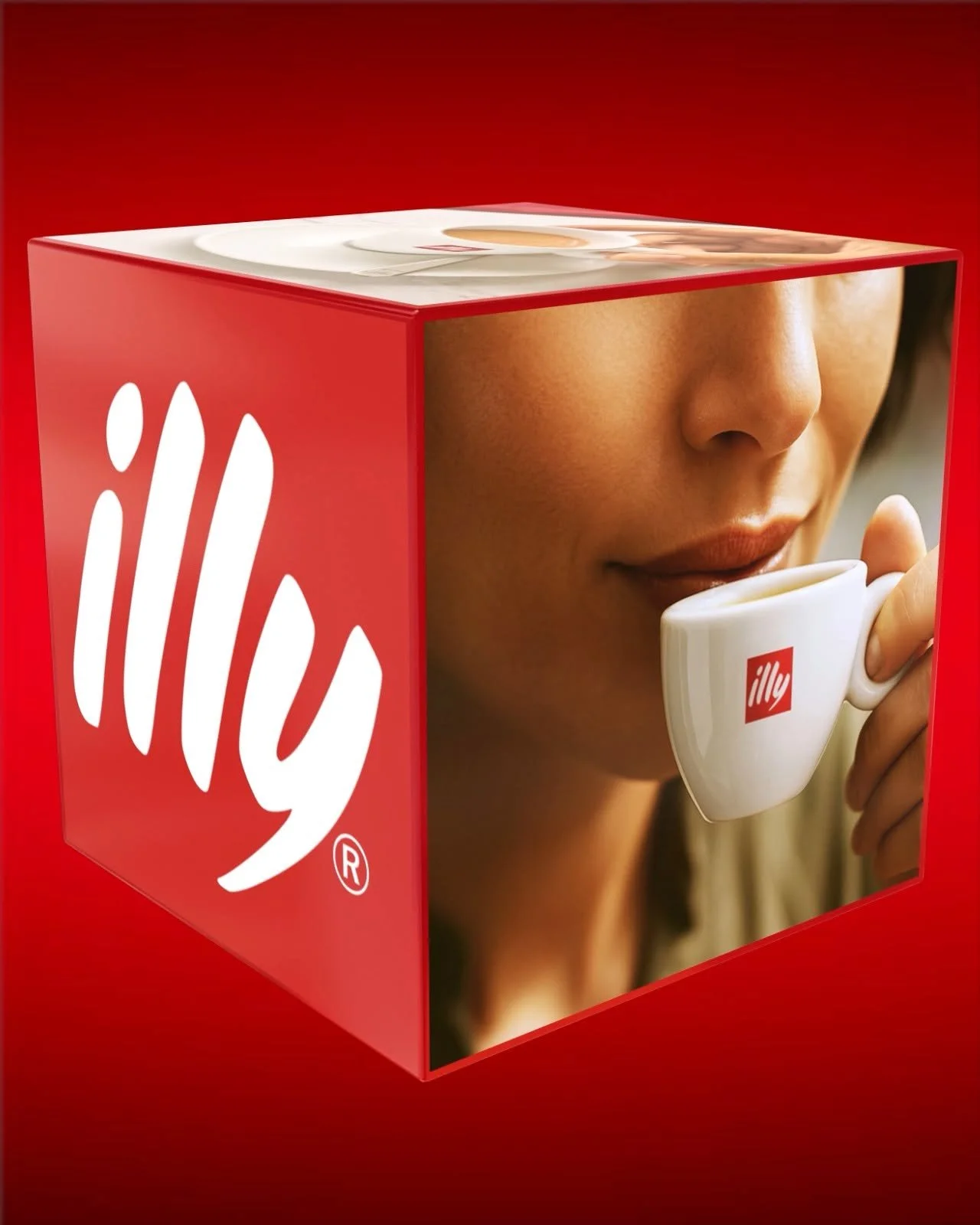 illy coffee cube advertisement showing a woman drinking espresso from a branded illy cup