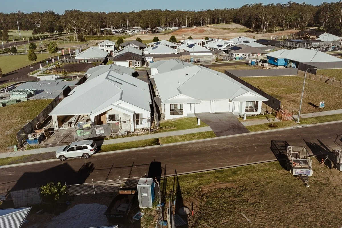 Two Morr projects side-by-side. 

One a duplex the other a custom single dwelling.

Both different but both built with the same care and dedication to quality and functionality!
