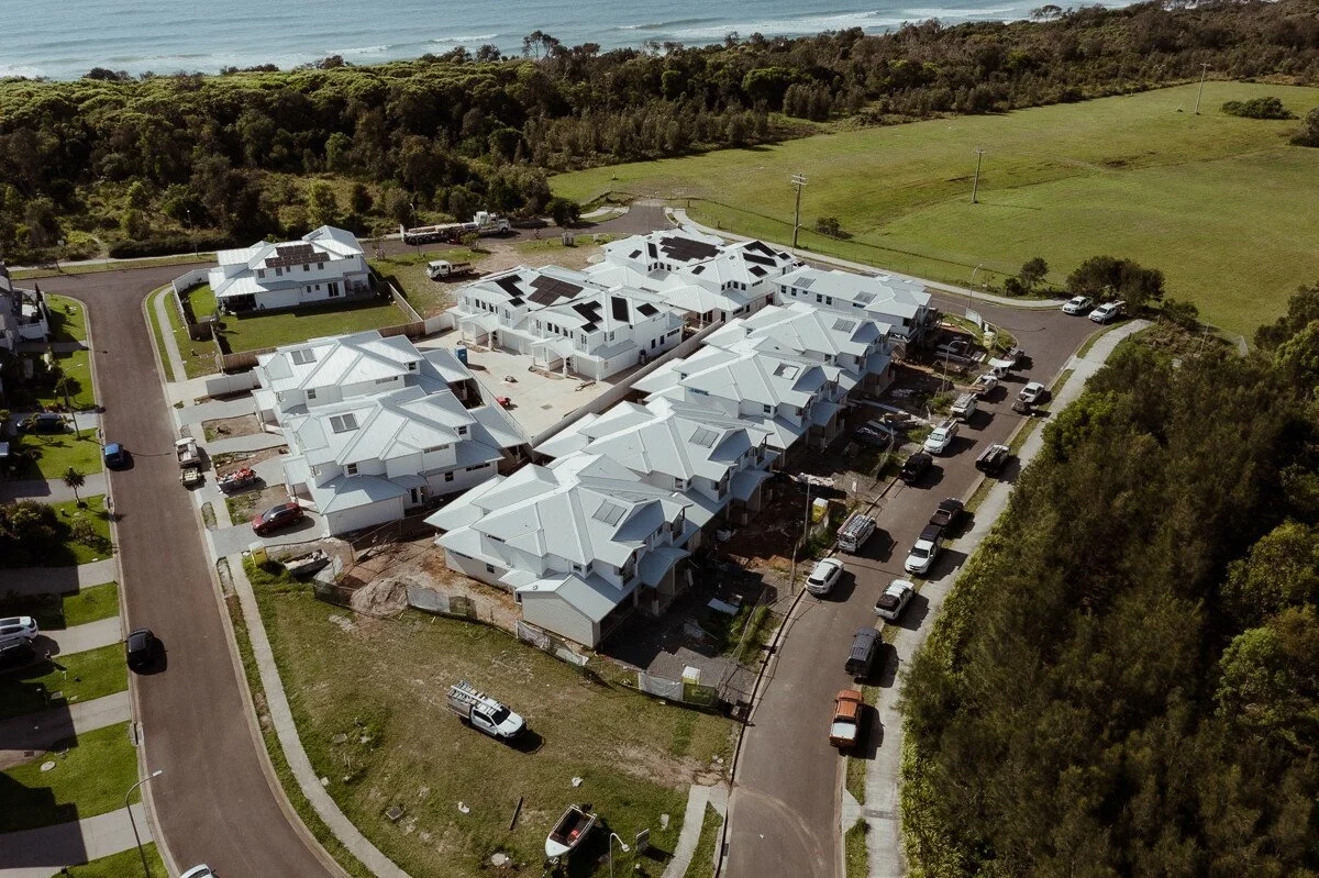 Drone image of Hampons style townhouses under construction.