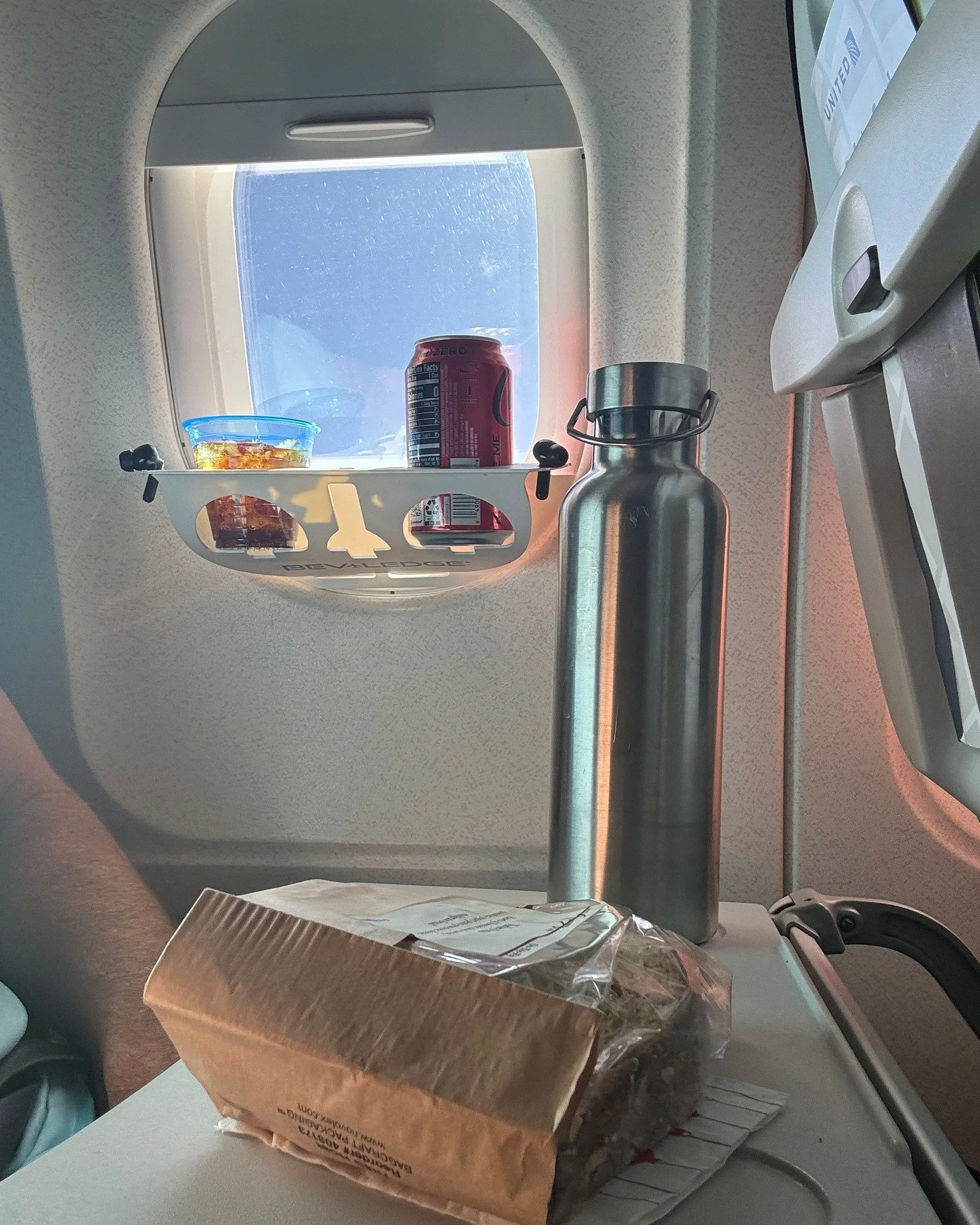 Flying high with a snack in hand and a view to remember! ✈️✨ 
What&rsquo;s your must-have in-flight treat? Share your travel essentials below! 
-
-
-
-
-
-
-
-
-
-
-
#FlyingHigh #InFlightExperience #AirplaneAdventures #SkyViews
#AirborneMoments #SkyS