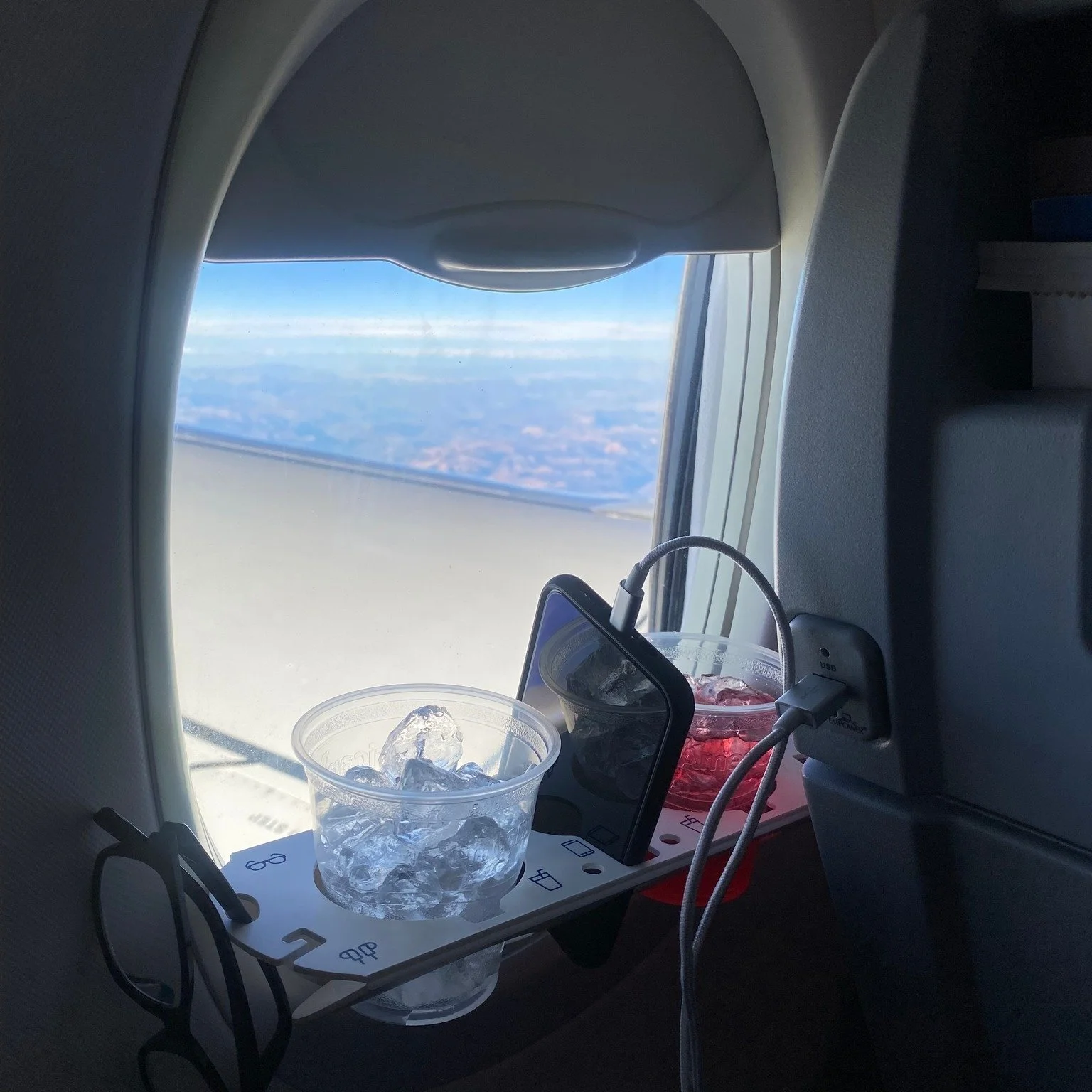 Current Status: Cruising with a view and two drinks. ✈️🥤
-
-
-
-
-
-
-
-
-
-
#TravelHacks #FlightHacks #WindowSeat #InFlight #BevLedge