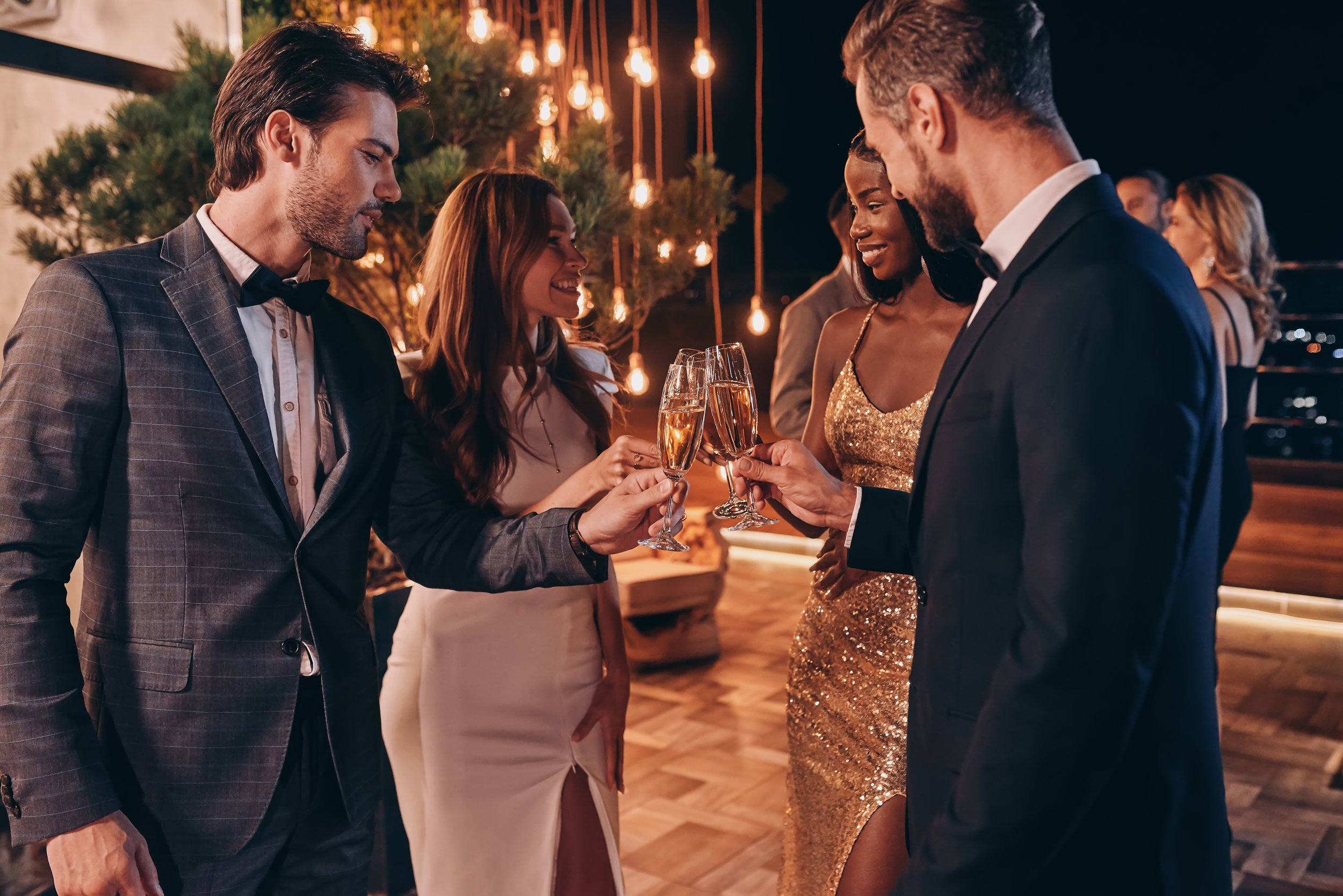 group-of-people-in-formalwear-toasting-with-champa-2023-11-27-05-15-47-utc.jpg