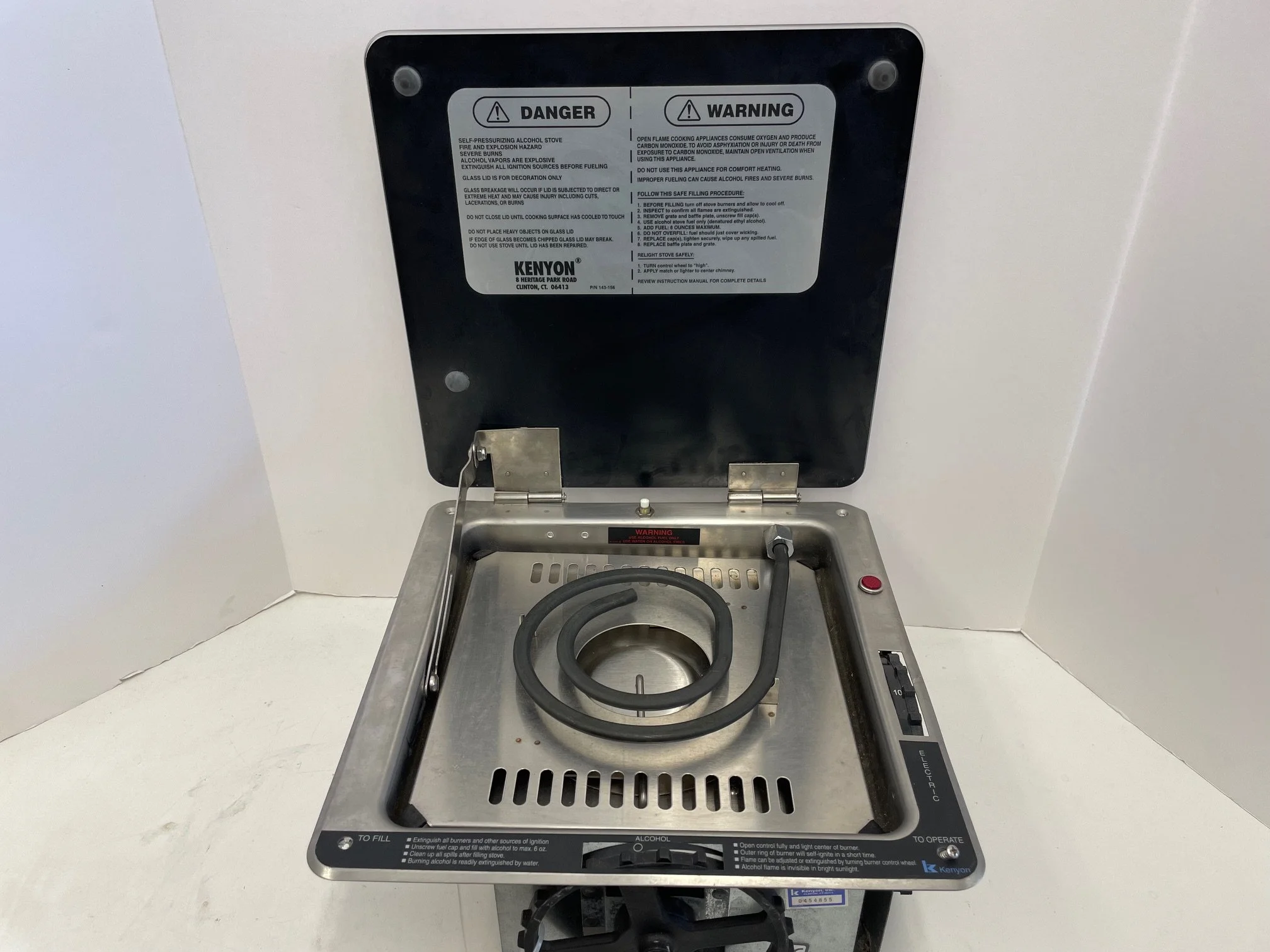 Kenyon non press. Alcohol / Electric glass top single burner stove 220v cut out 11” x 10” $200.00