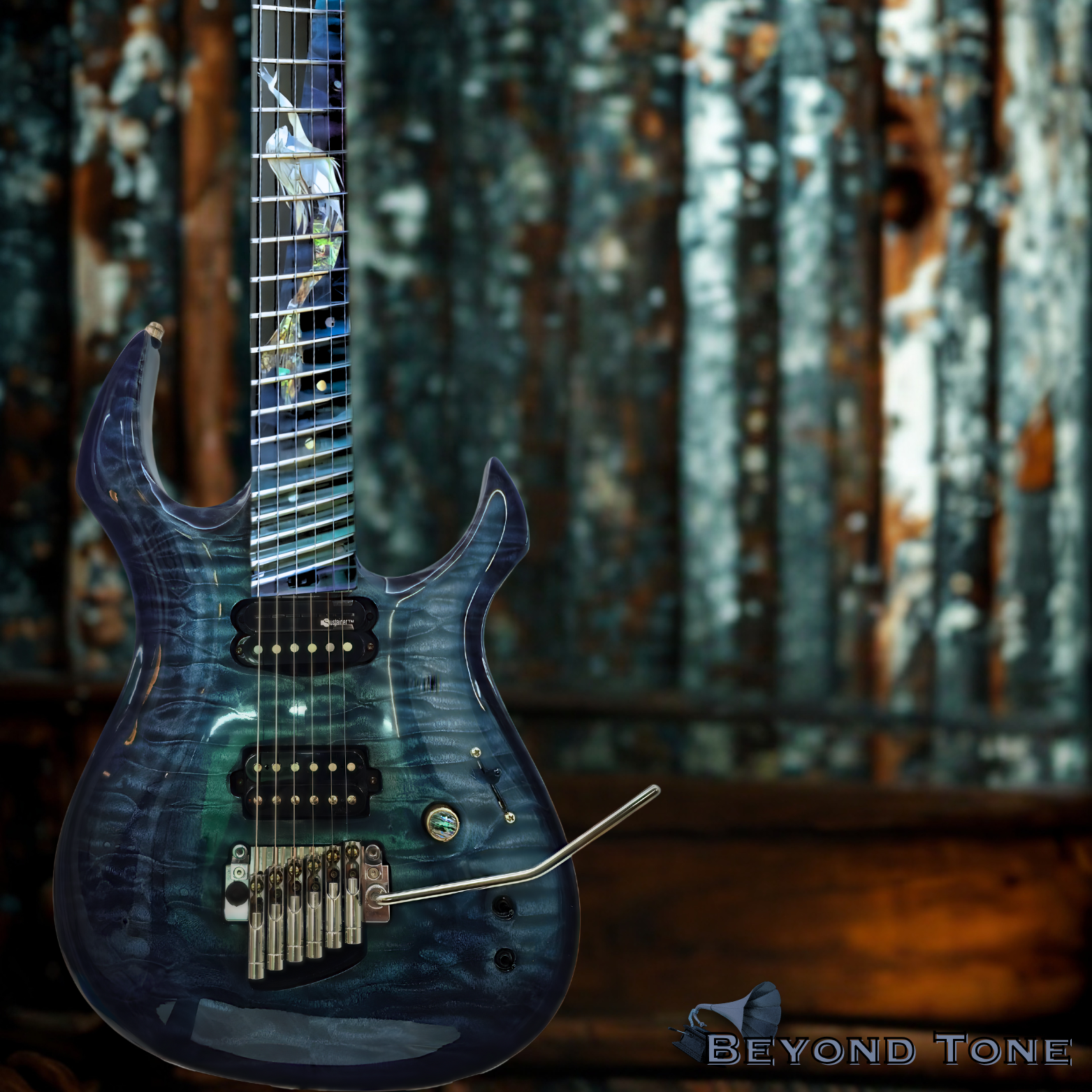 An electric guitar with a dark, blue-green, glossy, quilted maple top finish, featuring a double cutaway body, two humbucker pickups, a whammy bar, and a headless design with tuning pegs at the end of the fretboard. It is set against a blurred wooden
