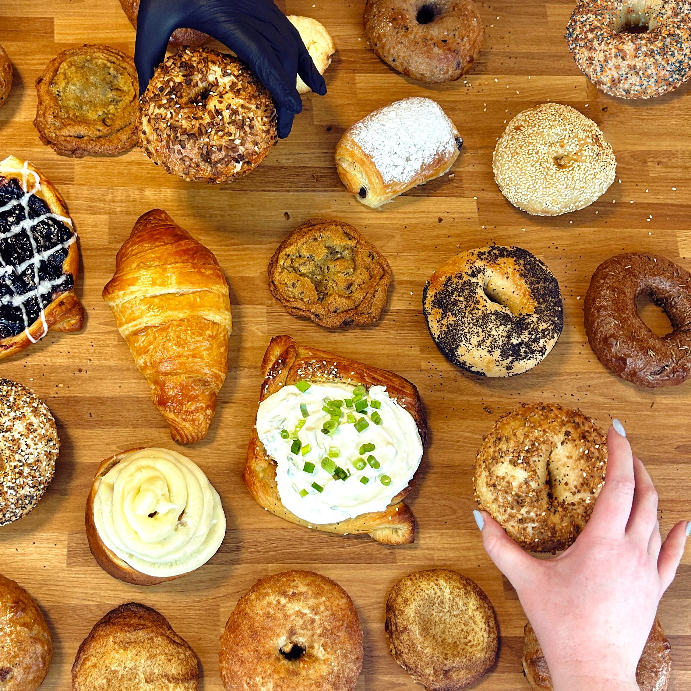 Various Pastries and Bagels such as cookies, danishes, croissants, cinnamon rolls & Bagels