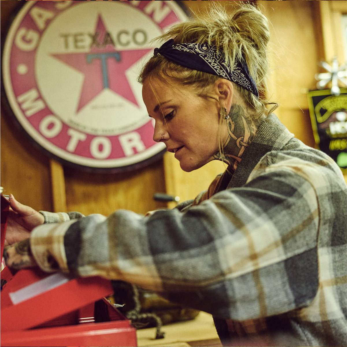 Medium cropped photo of woman reaching in toolbox