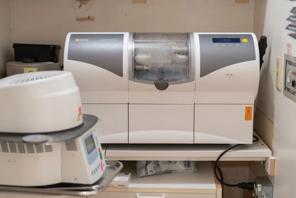 Dental milling machine in a dental laboratory setting.