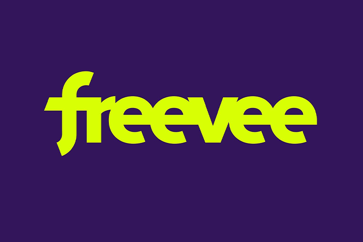 Le mot 'freeee' écrit en lettres vertes sur un fond violet.