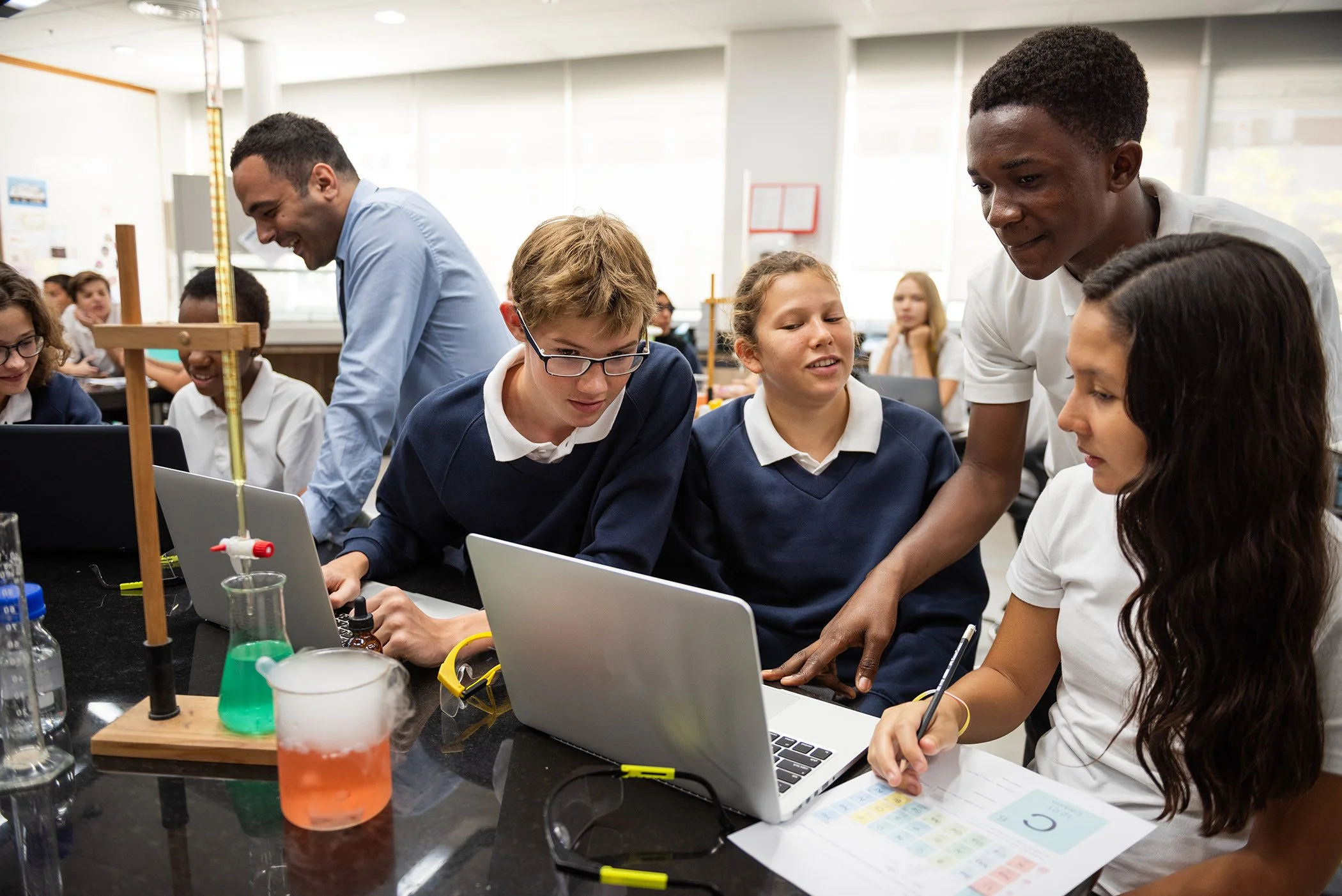 teenage independant school students in a science classroom
